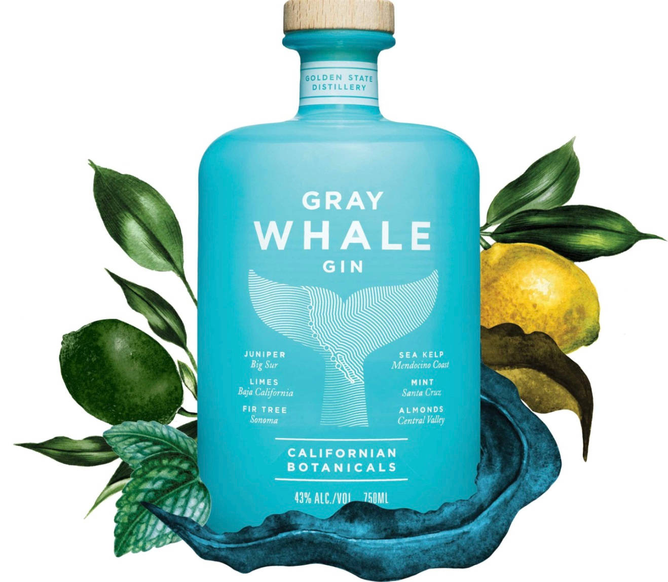 灰鯨琴酒午後優雅時光 壁紙 — 一個青綠色的Gray Whale Gin酒瓶，周圍是新鮮的青檸、薄荷和檸檬葉，放在深藍色波浪形底座上。