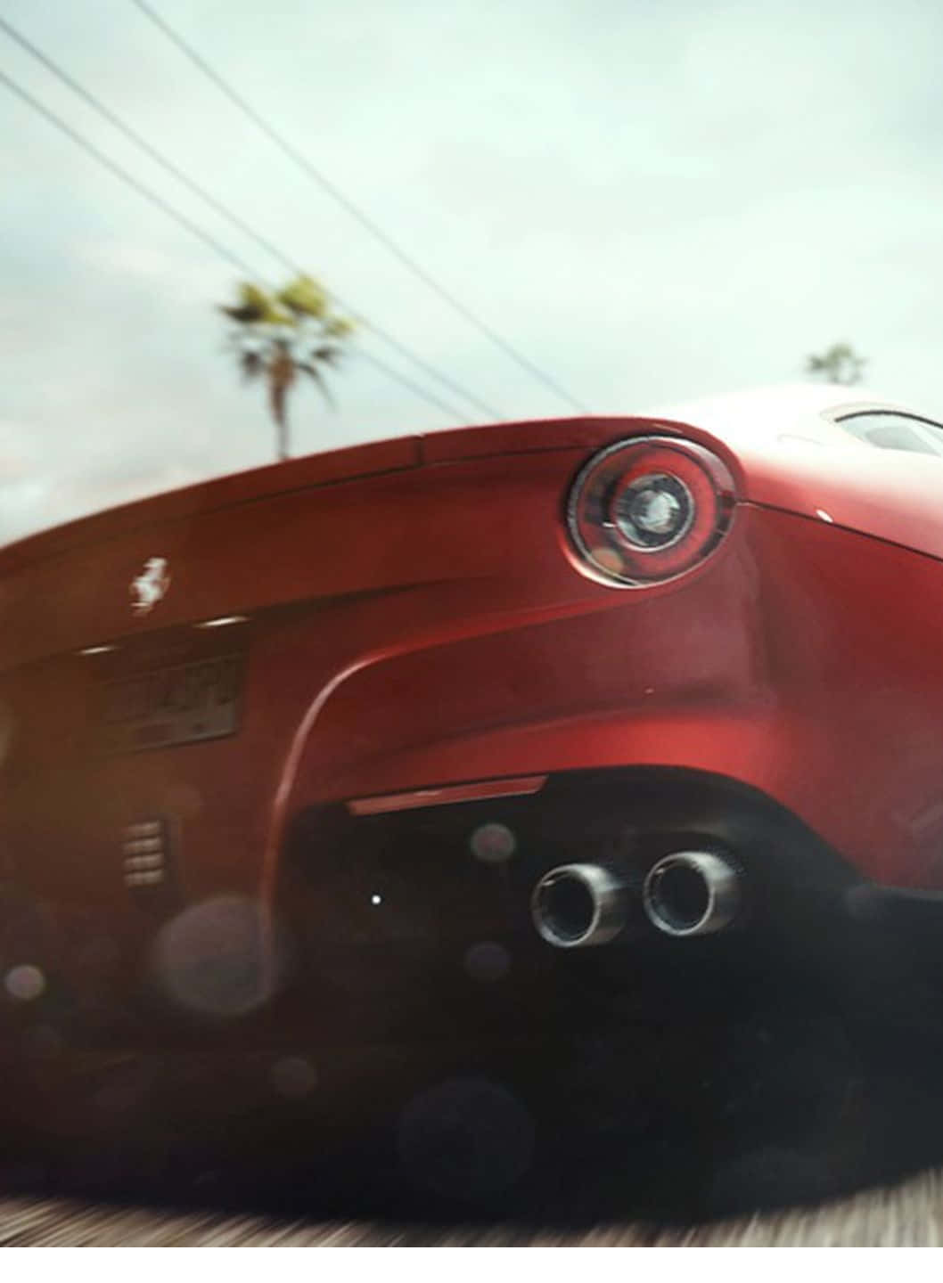 為 Pixel 3 量身打造的高解析度《Need for Speed Heat》背景 壁紙 — 低角度拍攝一輛紅色法拉利高速駛過，背景有模糊的棕櫚樹和電線。