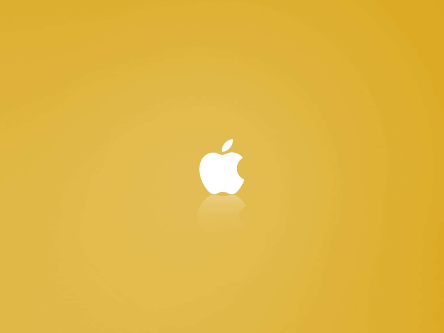 白色Apple標誌在金色背景上帶倒影