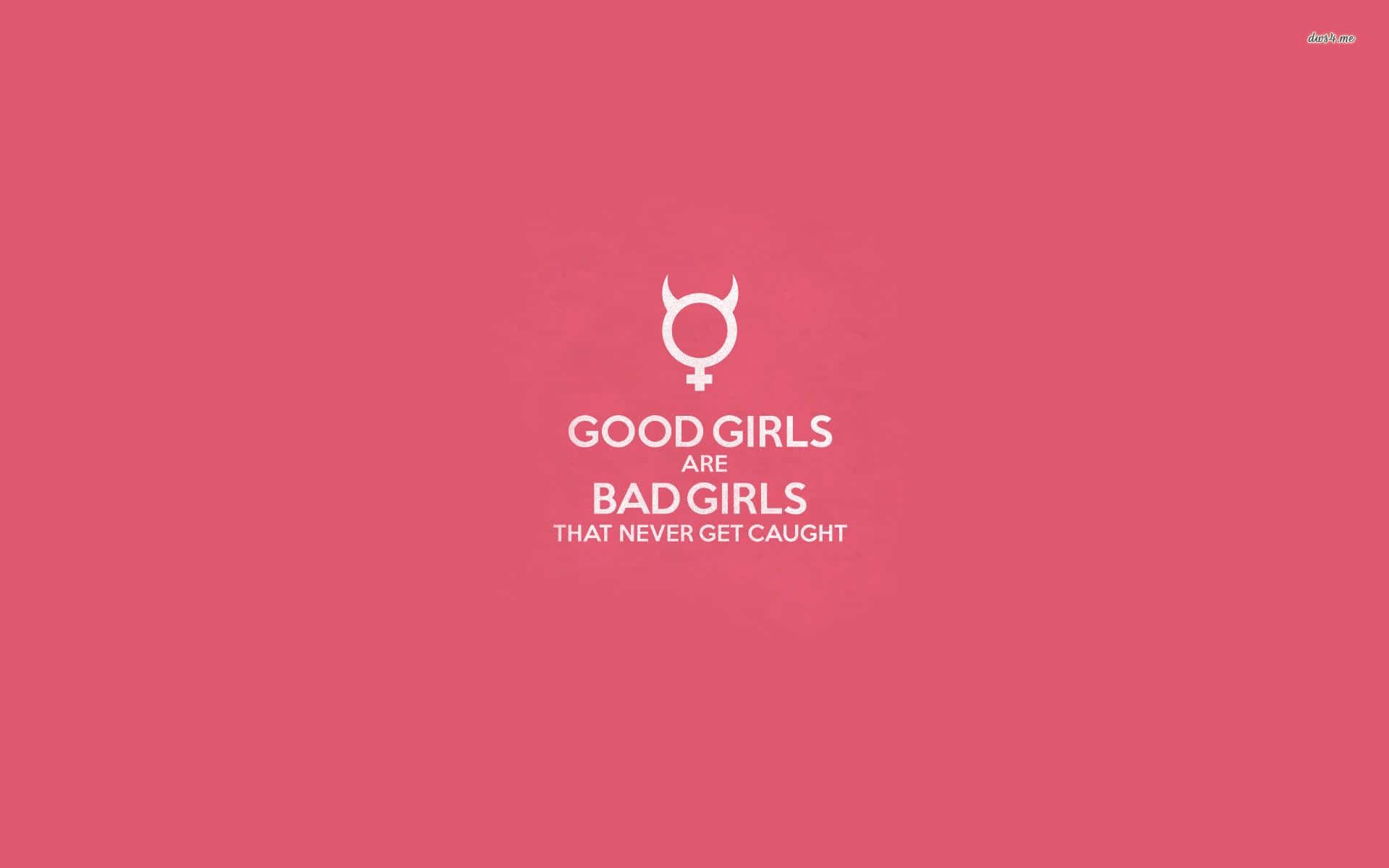 粉紅色背景，白色文字和惡魔符號，寫著「Good girls are bad girls that never get caught」。