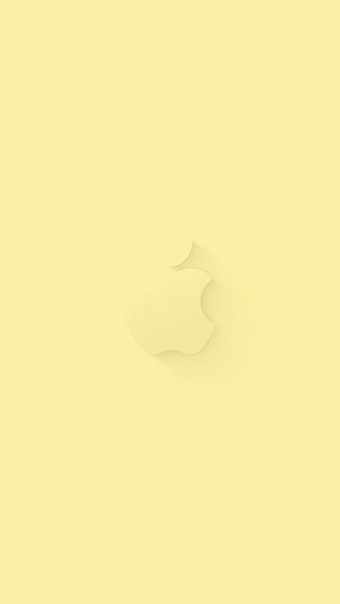 淡黃色極簡背景上的Apple標誌