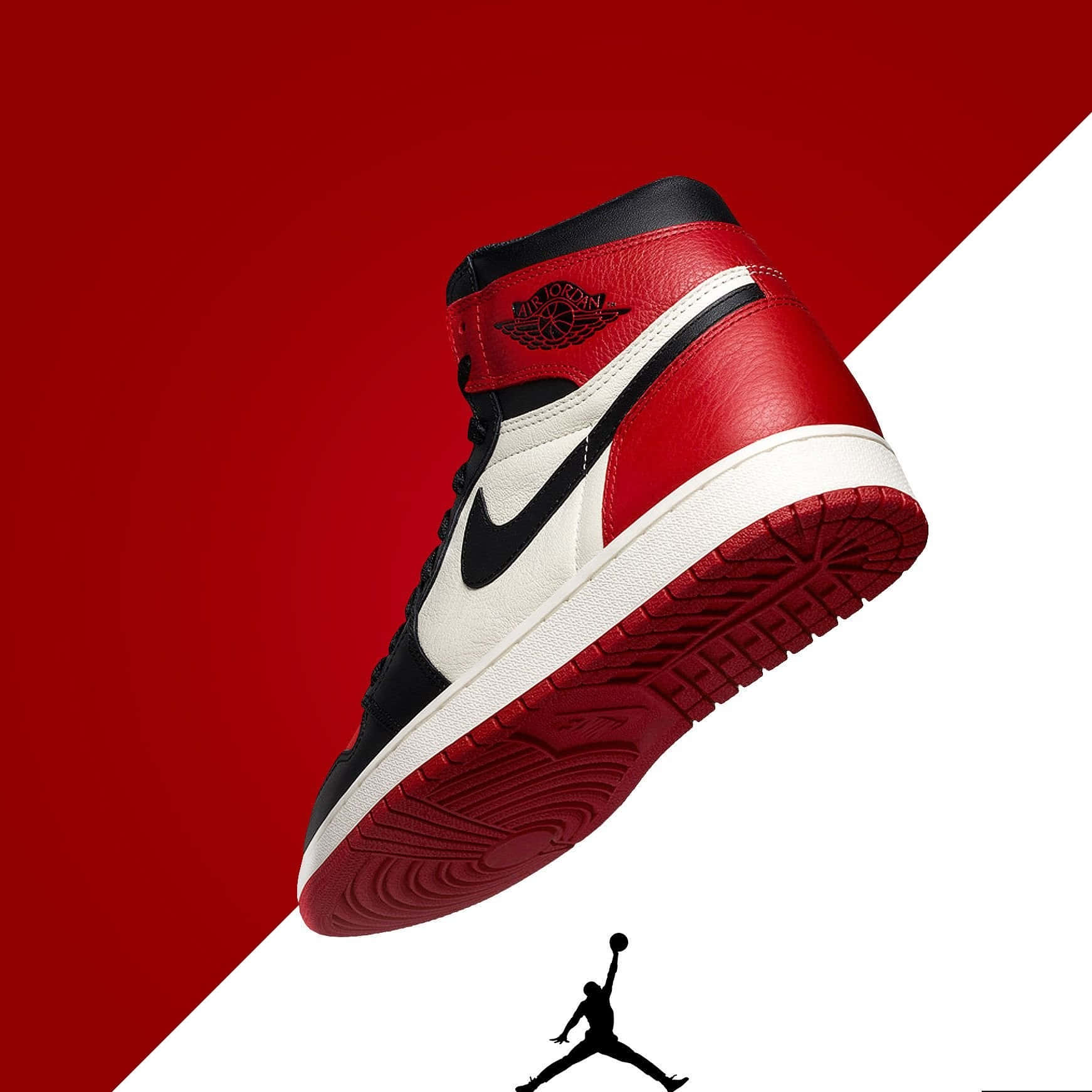紅、黑、白色的 Air Jordan 1 運動鞋漂浮，帶有 Jumpman 標誌剪影。
