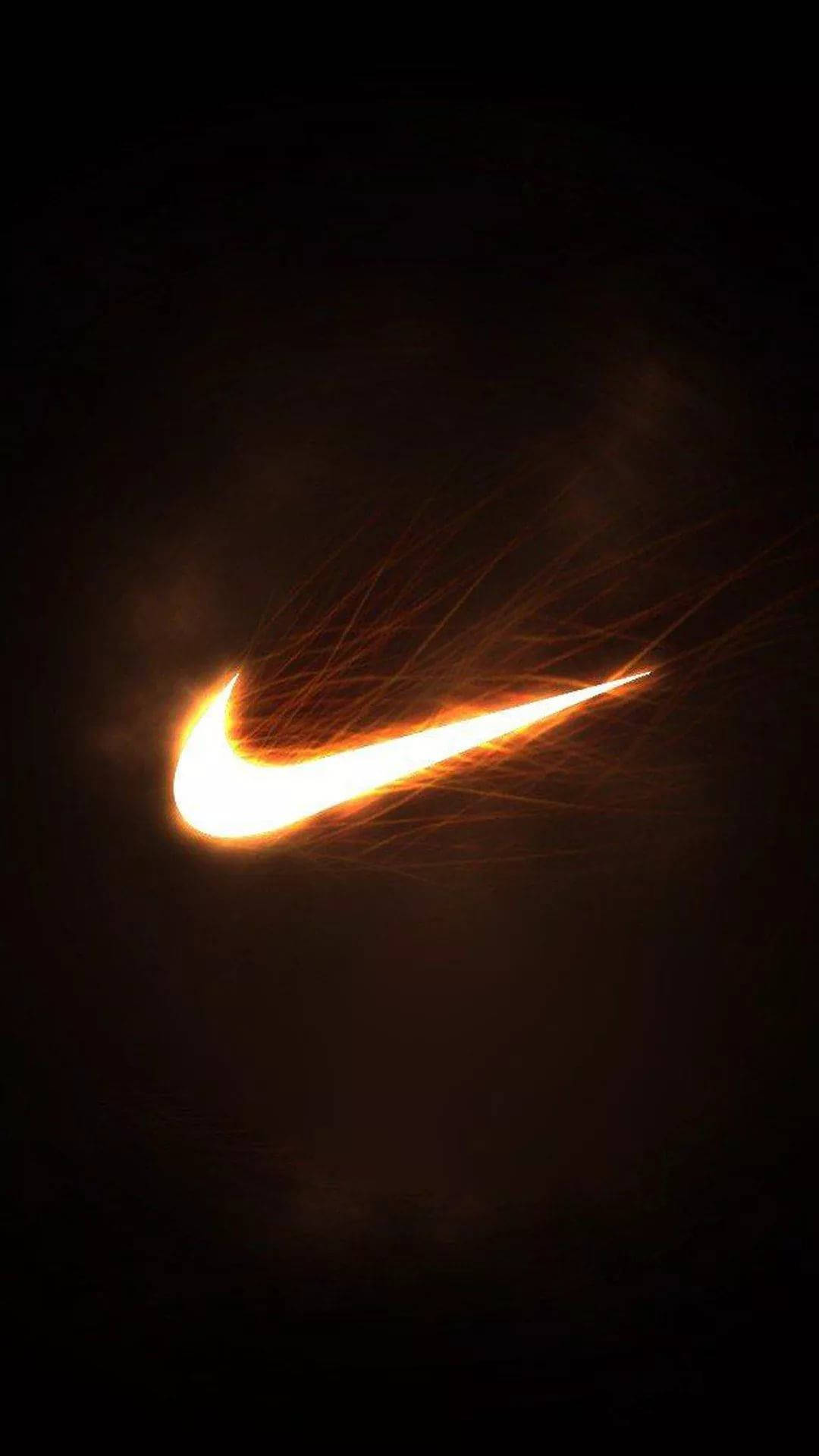 一個在黑暗背景下發光的熾熱橙色Nike剔號標誌。