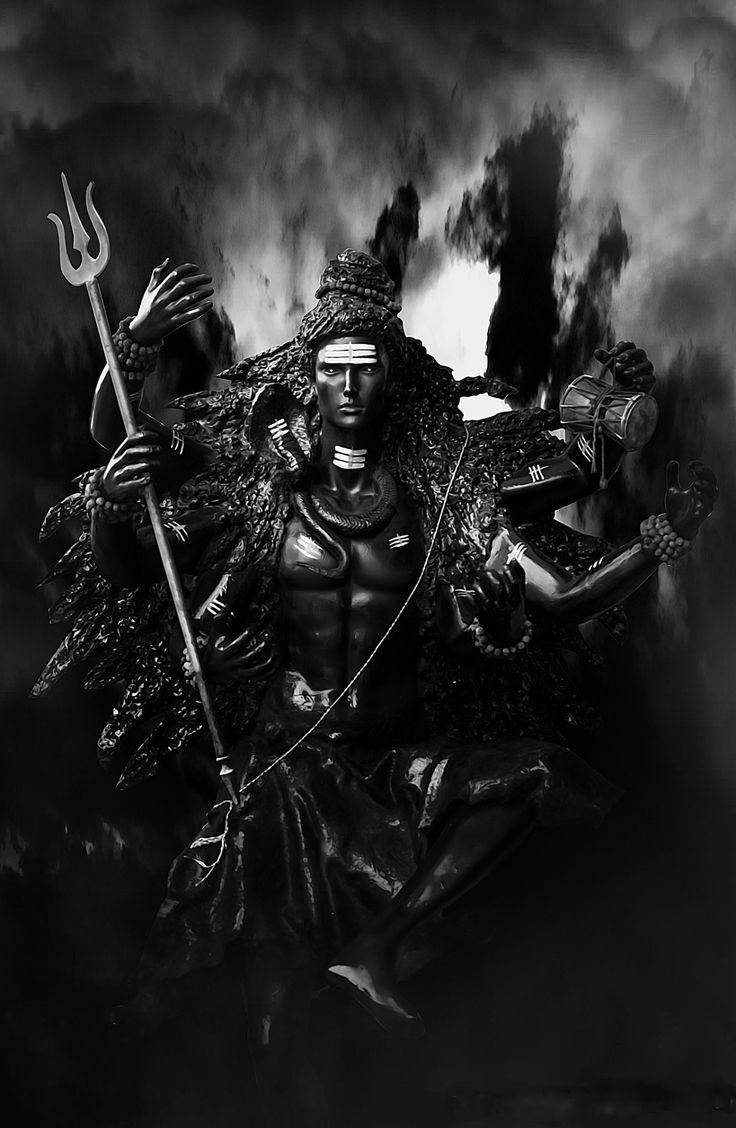 一個黑暗的單色雕像，描繪多臂神祇手持三叉戟和鼓。
