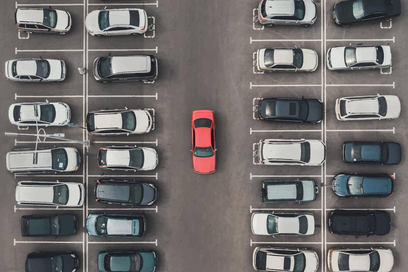 停車場的俯視圖，一輛紅色汽車在眾多停放的車輛中脫穎而出。