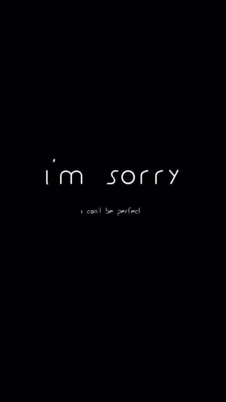 黑色背景上寫著「i'm sorry i can't be perfect」的文字壁紙。