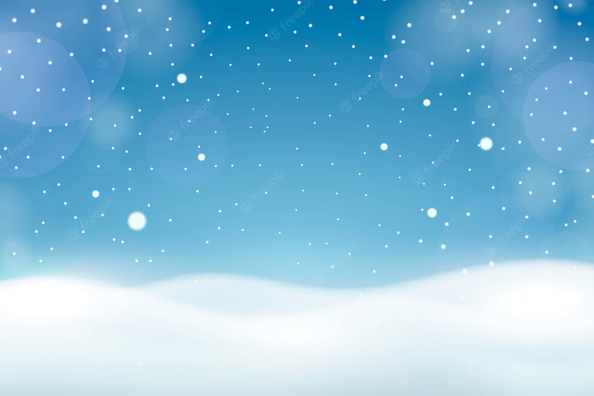 雪花在藍天下飄落在雪景上