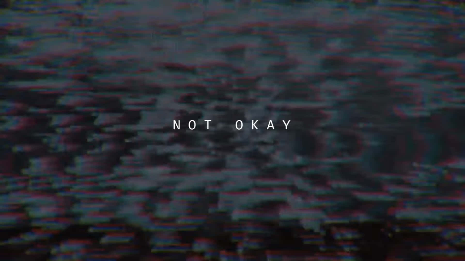 帶有紅藍噪聲和白色文字顯示 not okay 的故障效果。