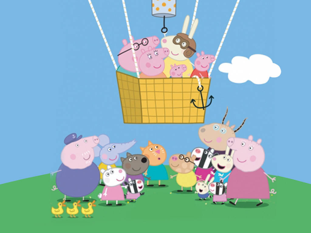 Peppa Pig 和朋友們在熱氣球上，其他人在草地上觀看。