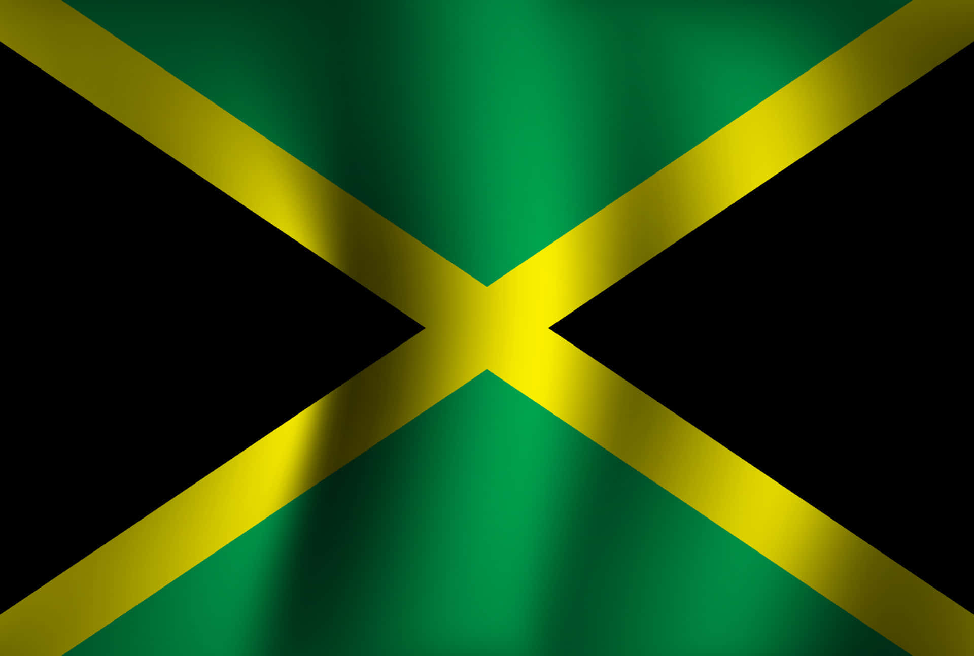 Jamaica 桌布 壁紙 — 牙買加國旗以鮮明的綠色、黑色和黃色在動態的布料質感中飄揚。