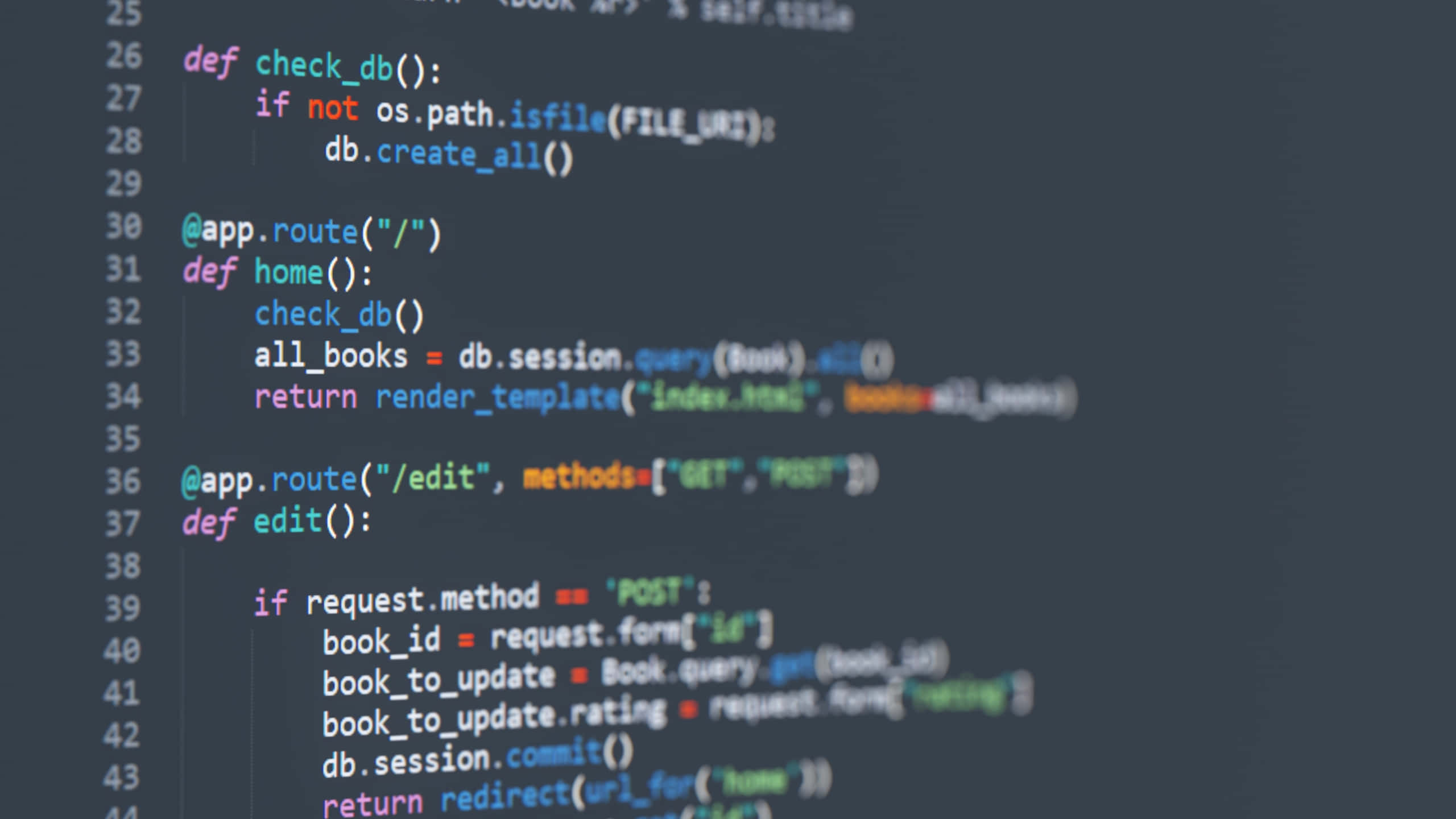 程式碼 桌布 壁紙 — 特寫發光的 Python 程式碼在黑色螢幕上，顯示書籍管理應用程式的資料庫和路由功能。