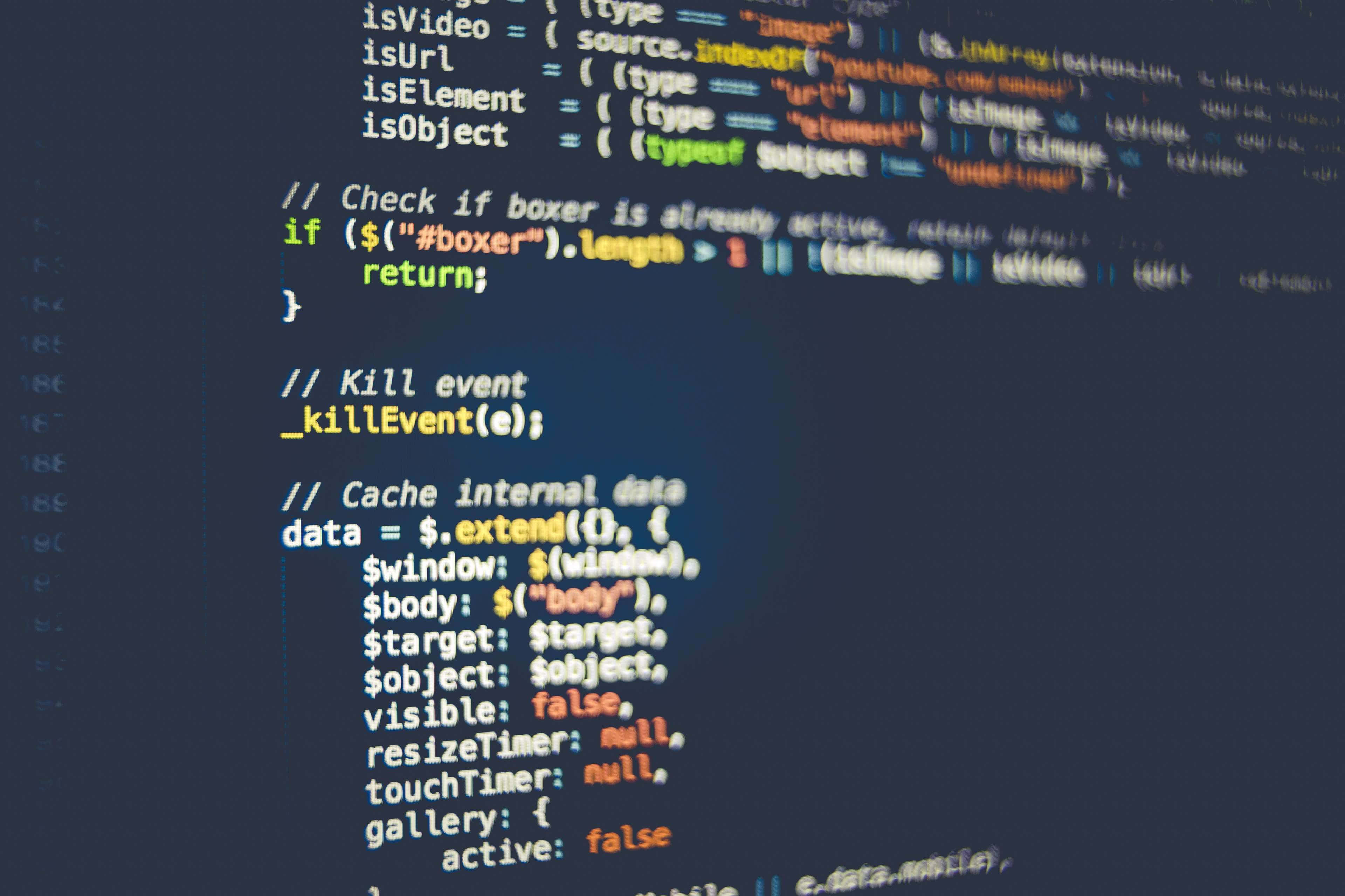 4K Programming 桌布 壁紙 — 特寫發光的彩色程式碼行在深色螢幕上顯示 JavaScript 和 jQuery 語法。