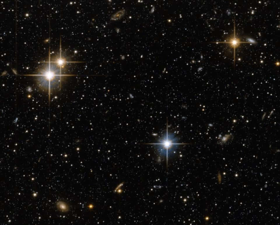 猶他州壯麗夜空中的銀河 壁紙 — 深邃太空視野，充滿無數恆星和遙遠星系，在黑色虛空中閃耀。