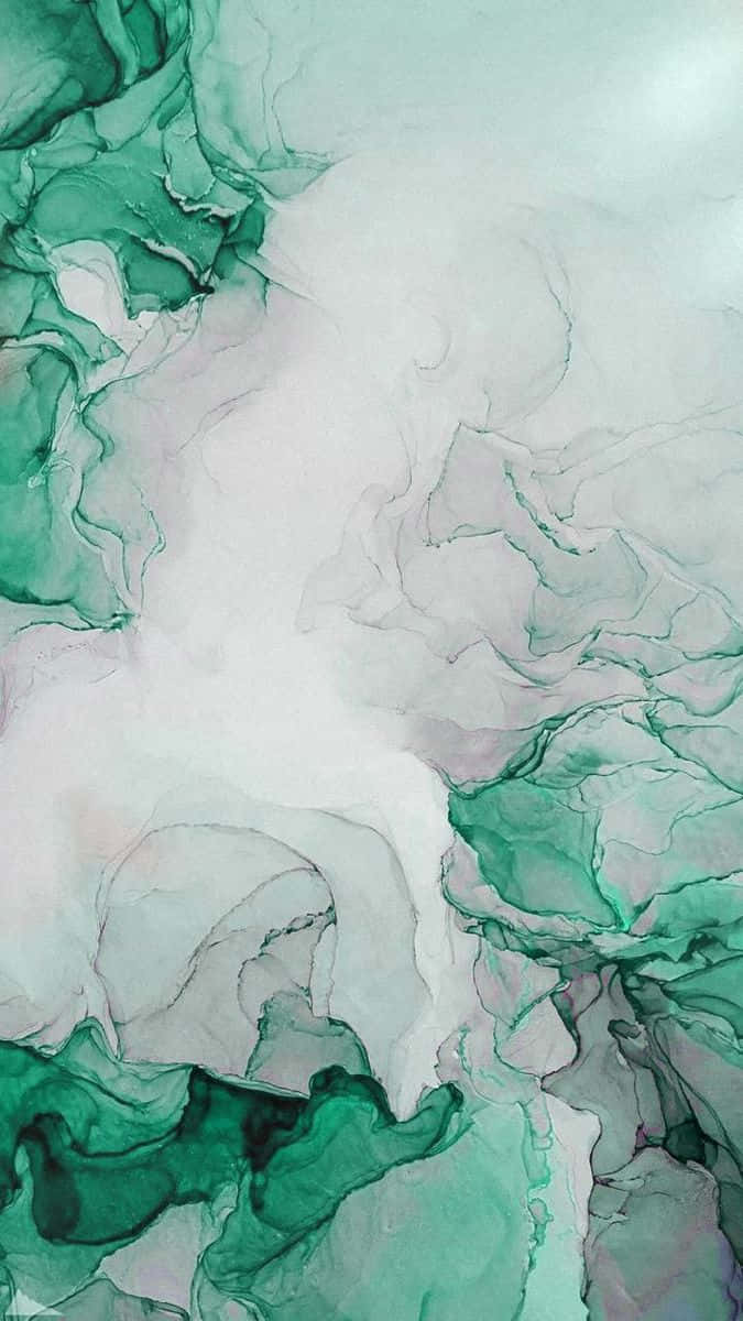 獨具魅力的薄荷綠大理石 壁紙 — 流動的翡翠綠和白色墨水在柔和的漸變背景上以有機圖案旋轉。
