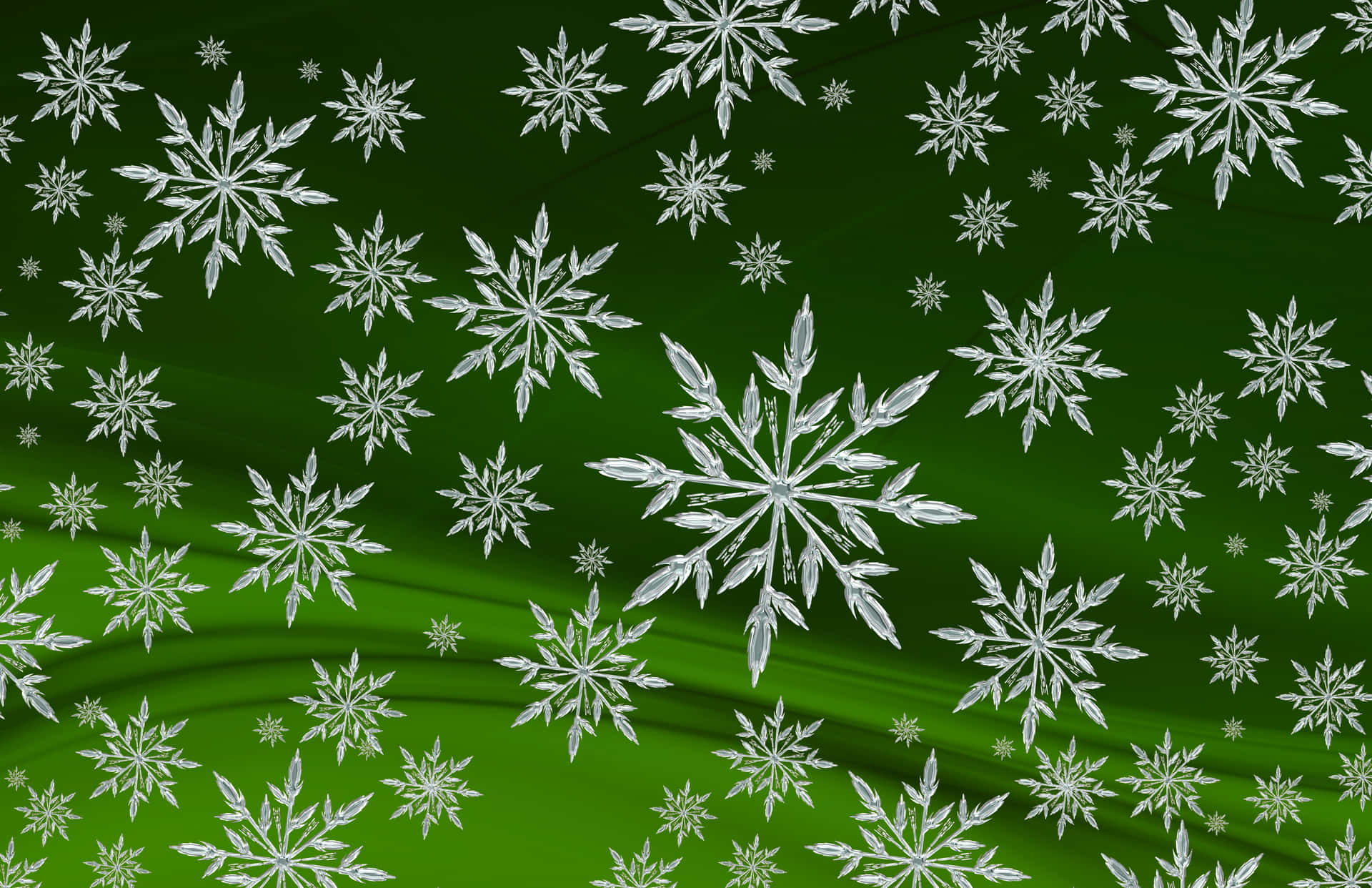 銀色雪花散落在鮮豔的綠色漸變背景上。