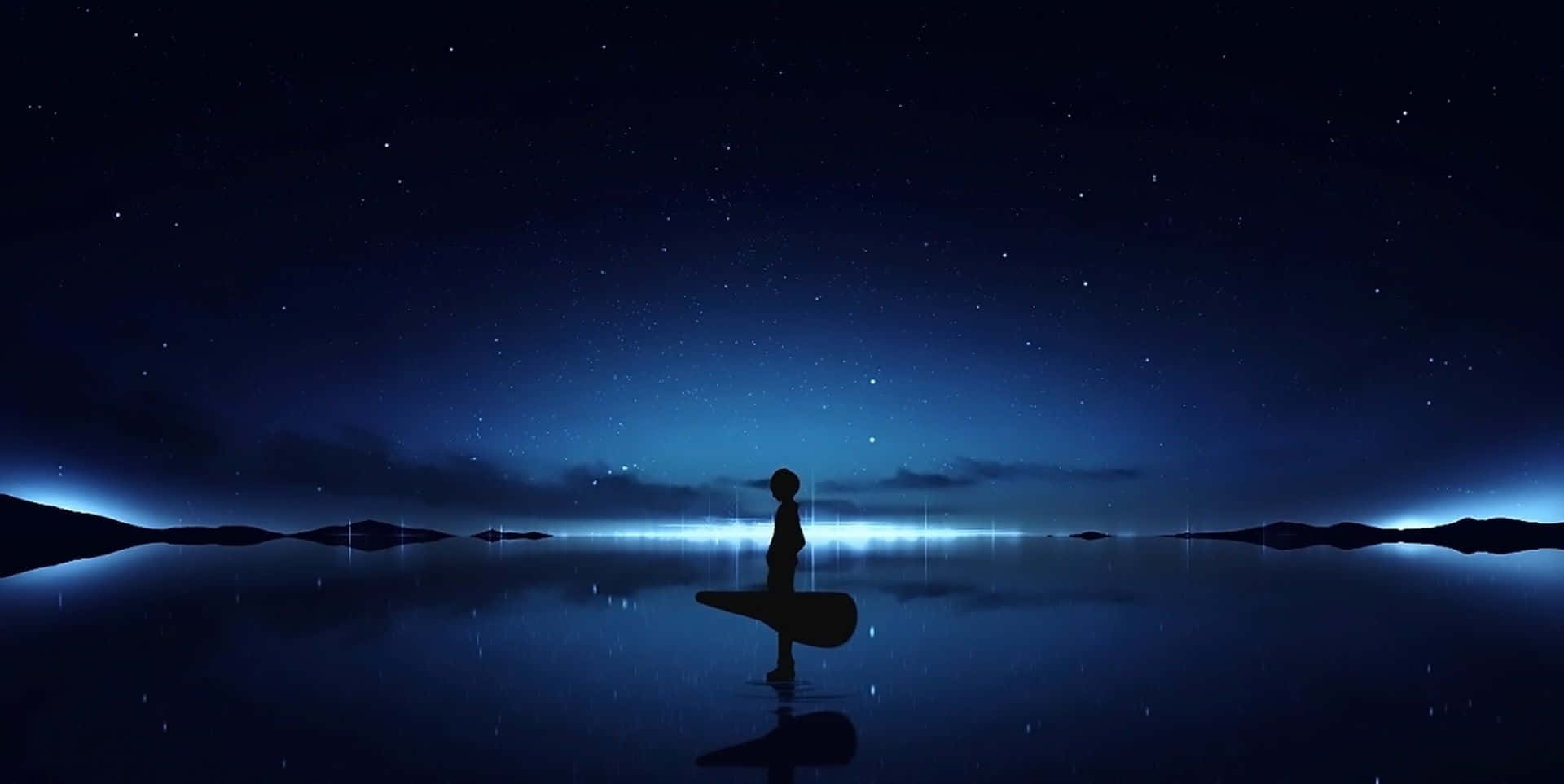 一個人在星空下站在水中的剪影。