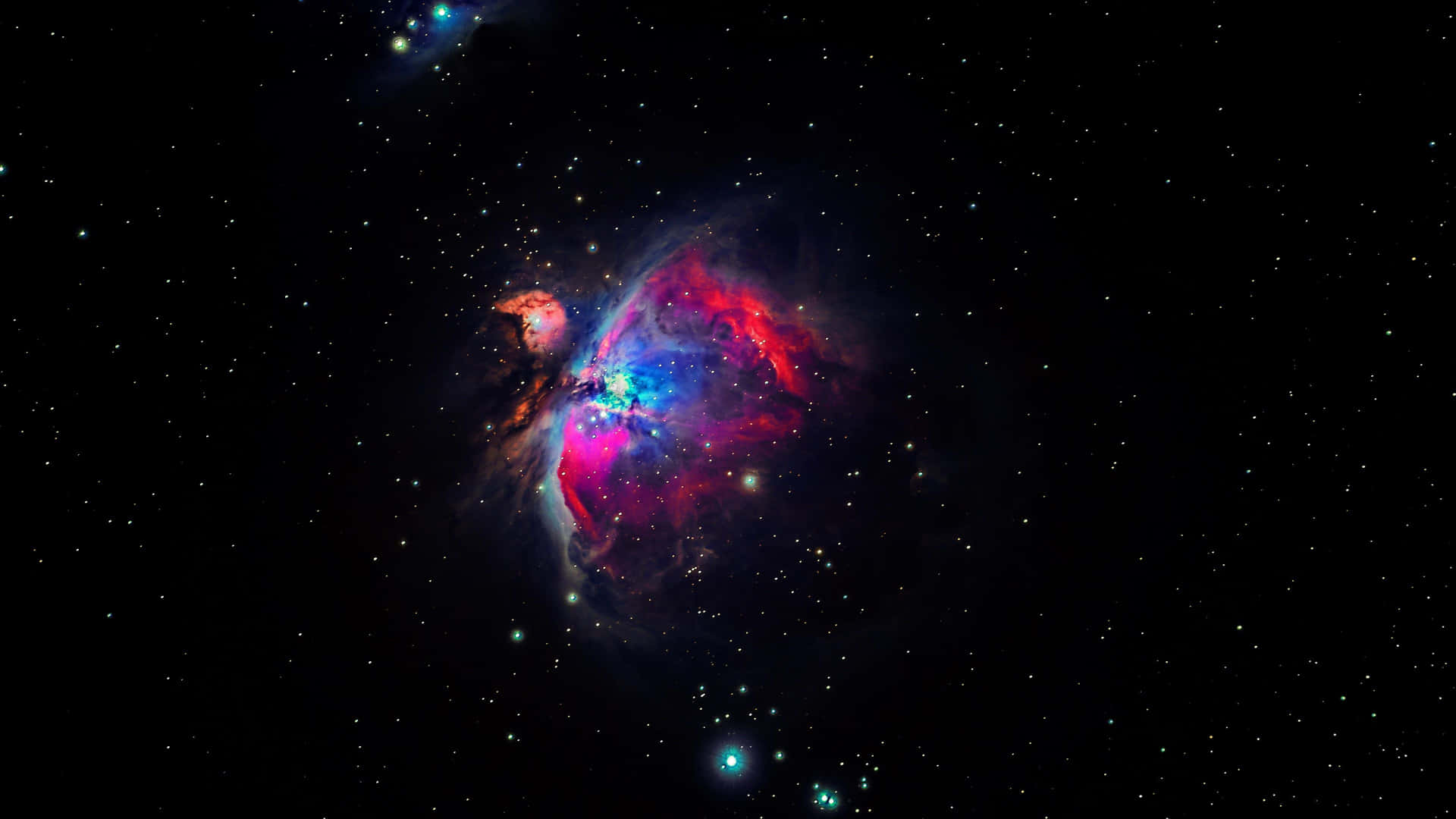 在深空星群中發光的充滿活力的紅色、藍色和藍綠色星雲。