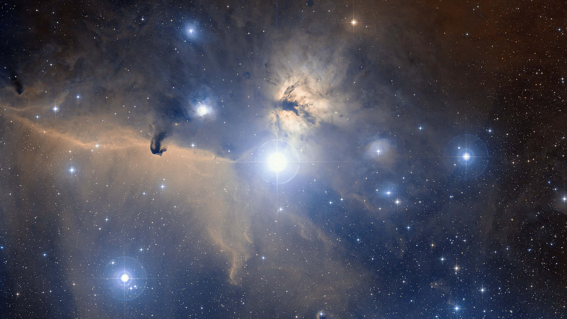Beautiful Space 桌布 壁紙 — 獵戶座星雲令人嘆為觀止的景色，藍色和橙色的氣體雲團在璀璨星光的照耀下閃閃發光。