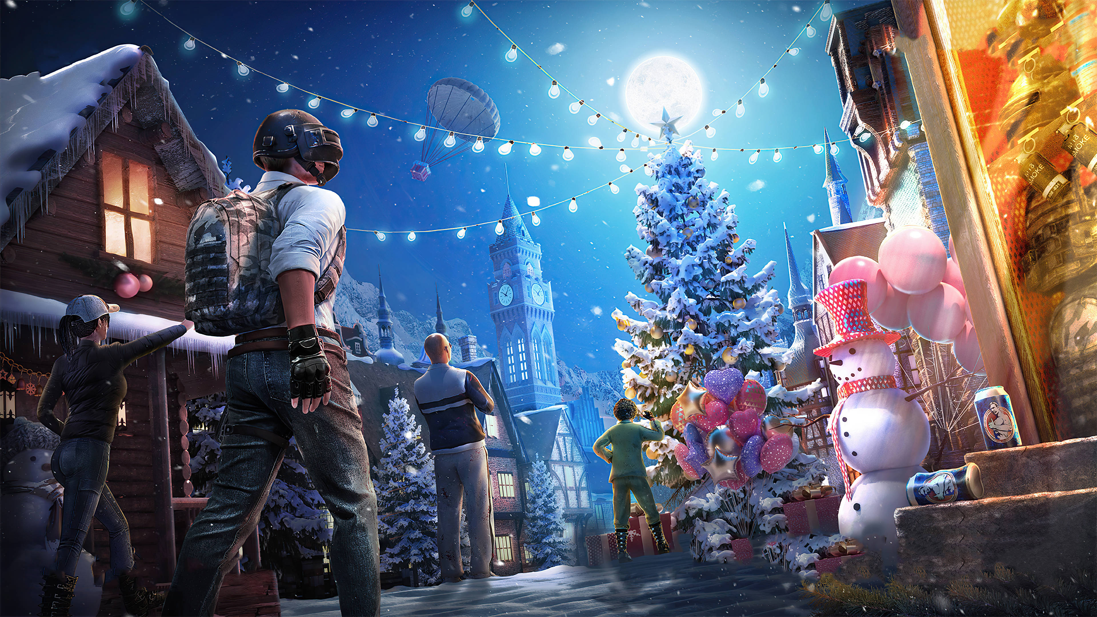 PUBG 桌布 壁紙 — 玩家在白雪皚皚的冬季村莊中，在滿月下以節日燈飾和裝飾樹慶祝聖誕節。