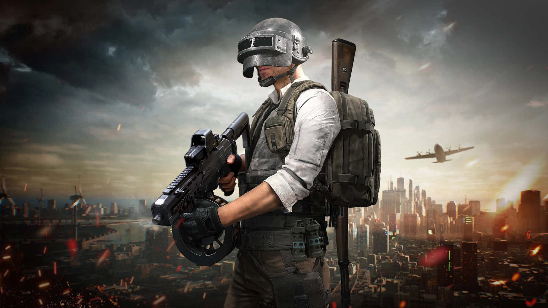 玩家為 PUBG 第 17 季做好準備！ 壁紙 — 一名身穿戰鬥裝備的士兵手持步槍，背景是戰火摧殘的城市天際線，頭頂有飛機飛過。