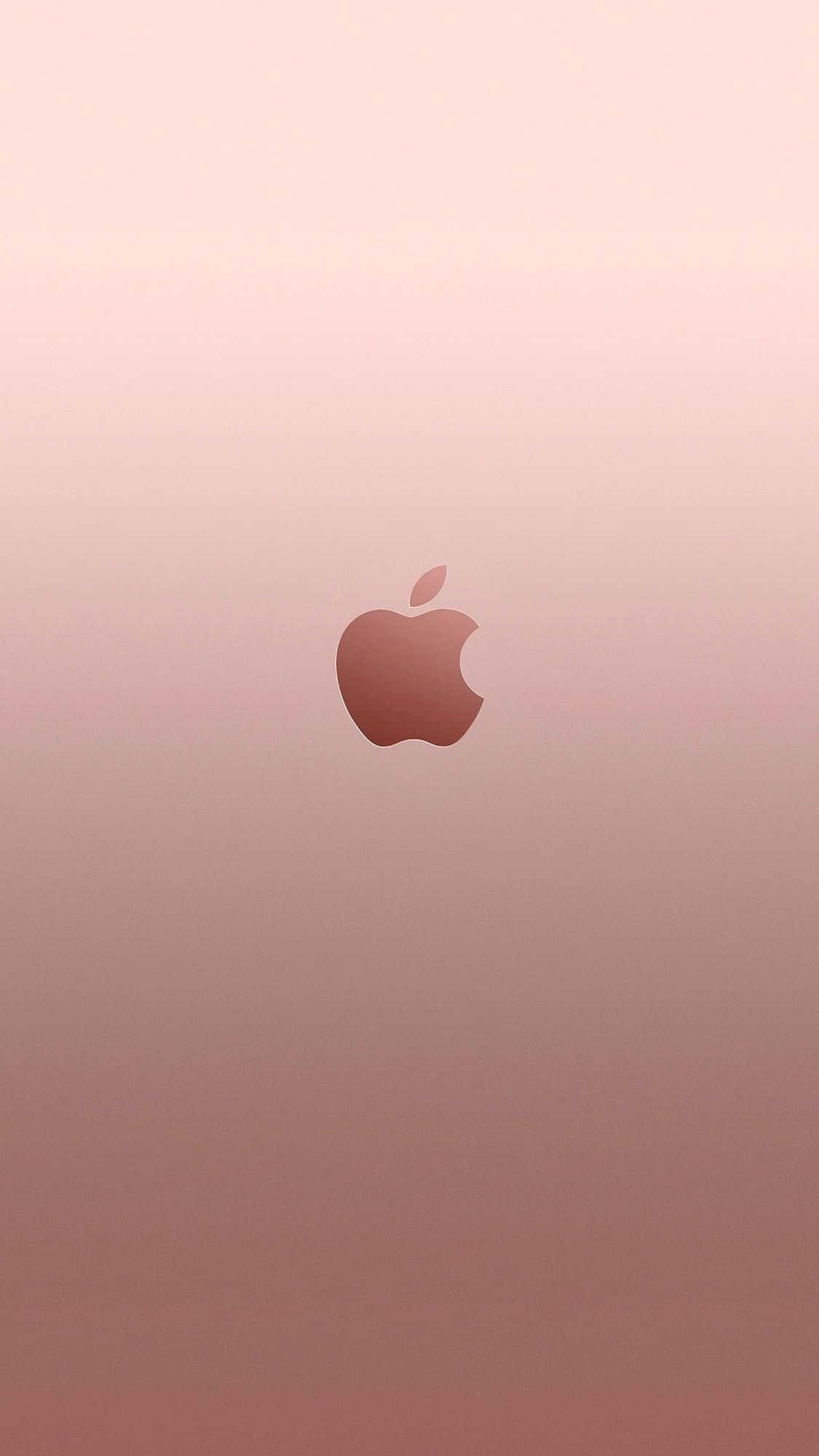 玫瑰金中的優雅之美 壁紙 — 一個極簡玫瑰金色Apple標誌，居中於柔和粉紅與紫紅色的漸變背景上。