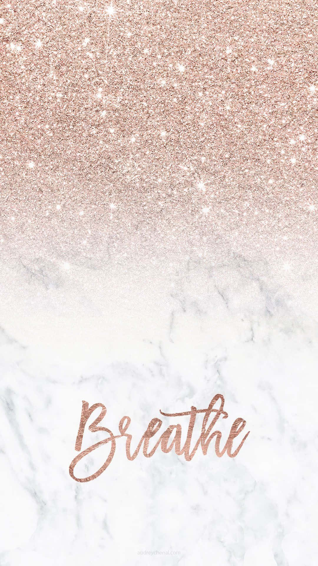 玫瑰金閃粉褪入大理石，並以草書寫上 breathe 一字。