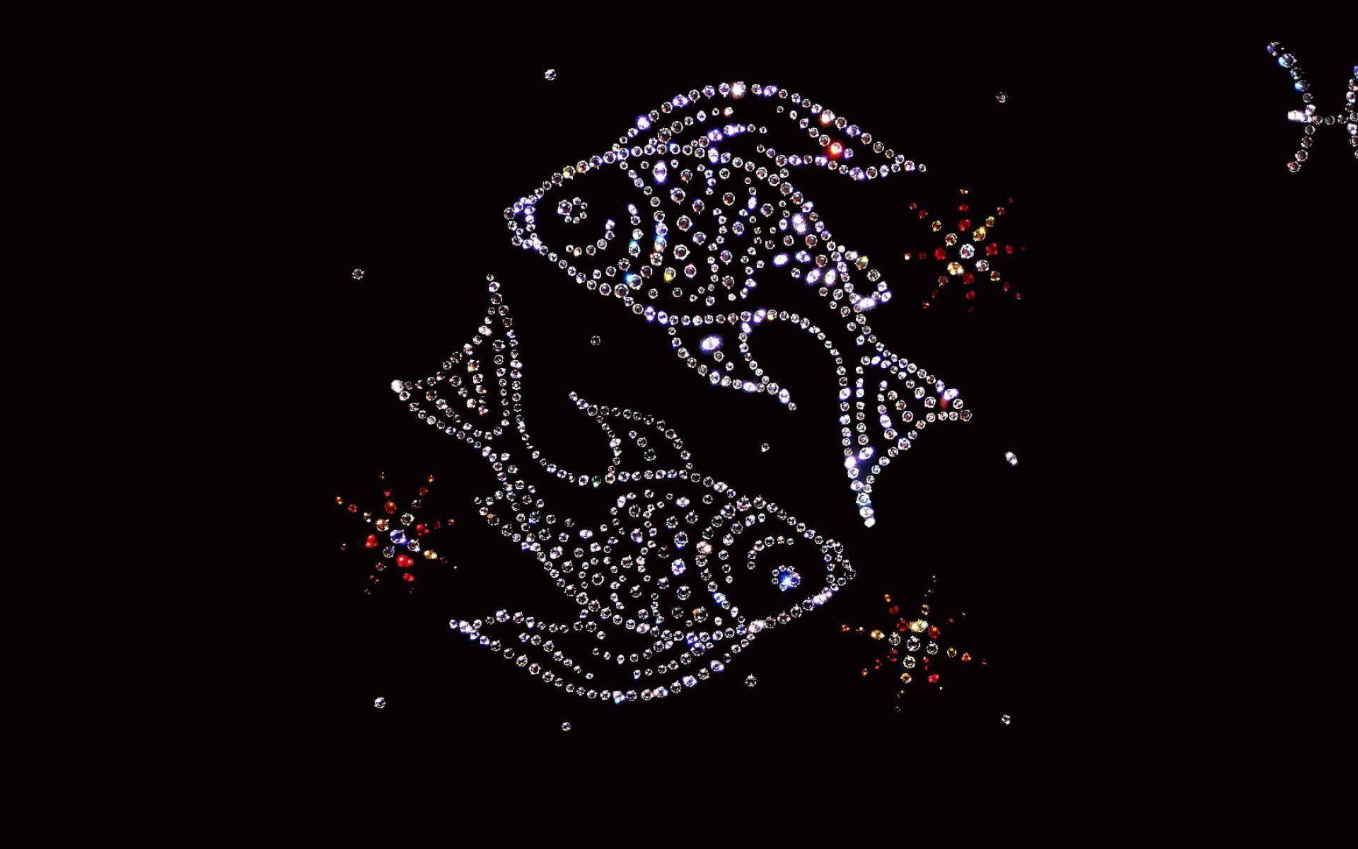 珠飾雙魚座魚形符號 壁紙 — 兩個魚星座在黑色背景上閃爍著閃亮的水晶，周圍環繞著色彩繽紛的星爆。