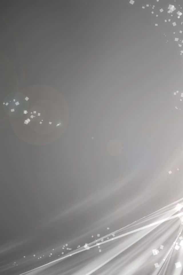 帶有發光光條和閃爍粒子的抽象灰色背景。