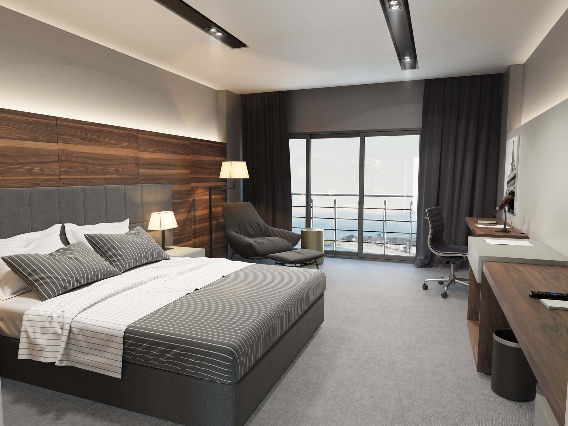 Hotel Room 桌布 壁紙 — 現代酒店客房，配有灰色床單、木質床頭板和可俯瞰海洋的陽台，光線明亮。
