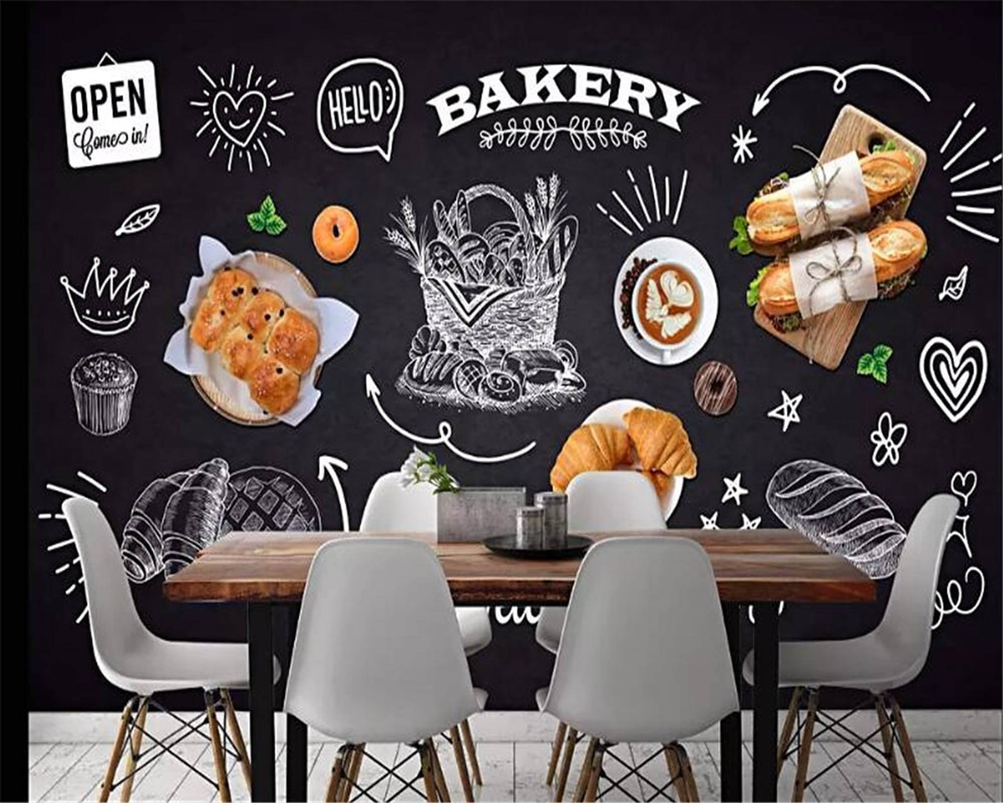 現代風格烘焙店 壁紙 — 舒適的麵包店內部，黑板牆上繪有手繪糕點、咖啡和歡迎塗鴉，圍繞著一張木桌和白色椅子。