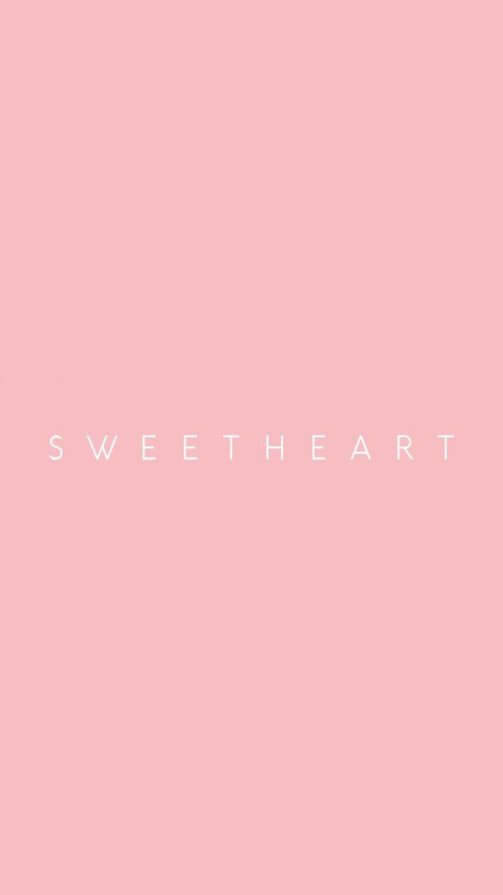甜心純粉壁紙 壁紙 — 簡約粉紅色背景，中央有白色大寫字母「sweetheart」。