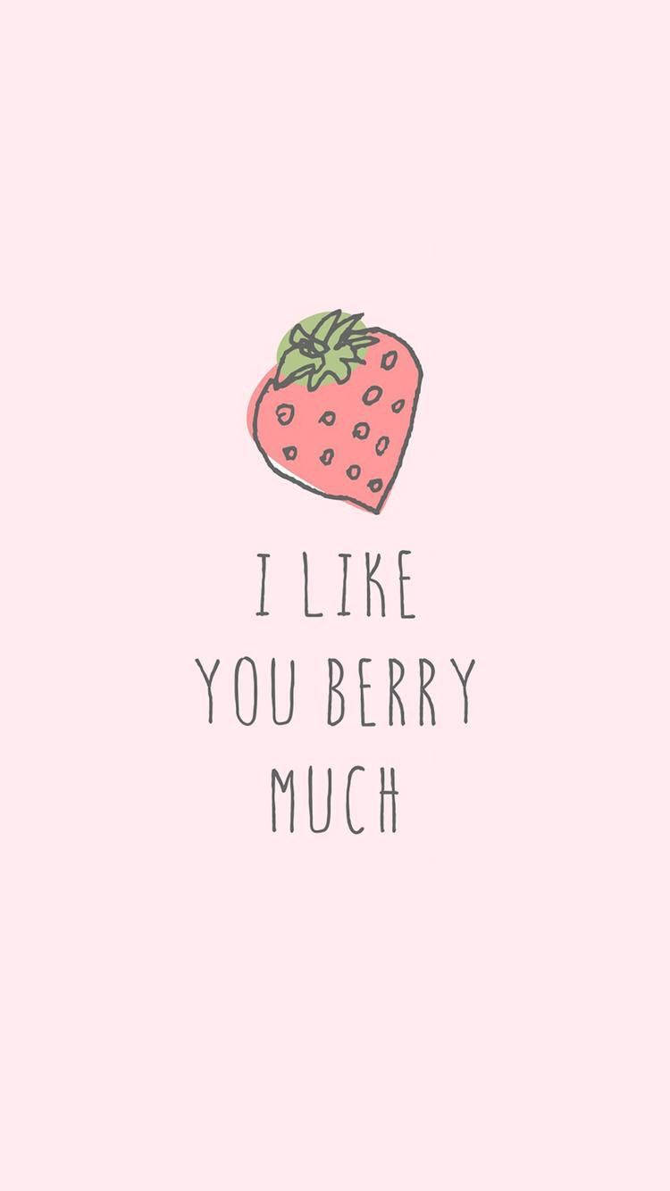 一個粉紅色草莓，帶有綠色葉子，以及粉紅色背景上的文字 I LIKE YOU BERRY MUCH。