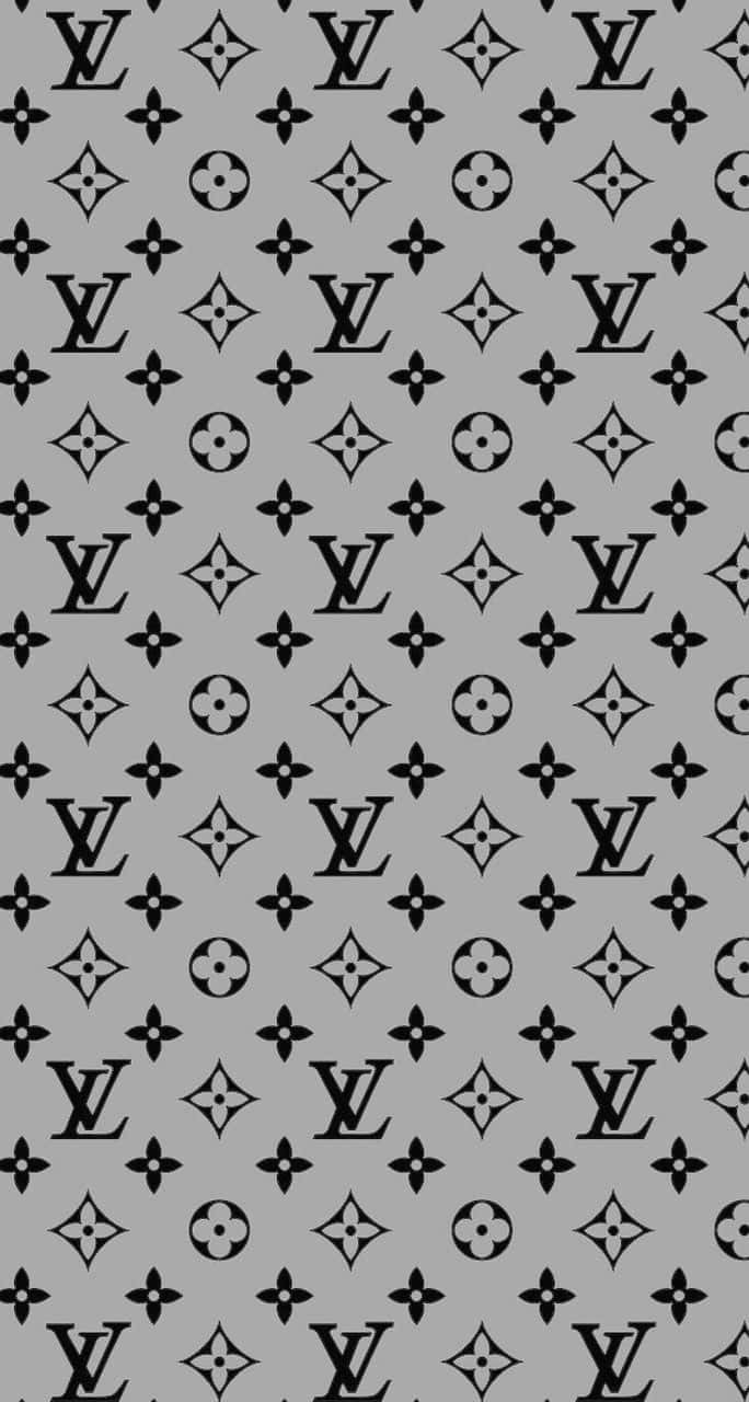 灰色牆紙，帶有重複的黑色 Louis Vuitton 標誌和花卉設計。