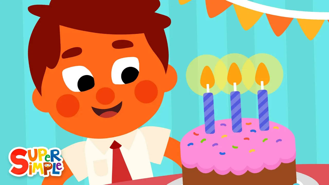 開心卡通男孩用蛋糕和蠟燭慶祝生日
