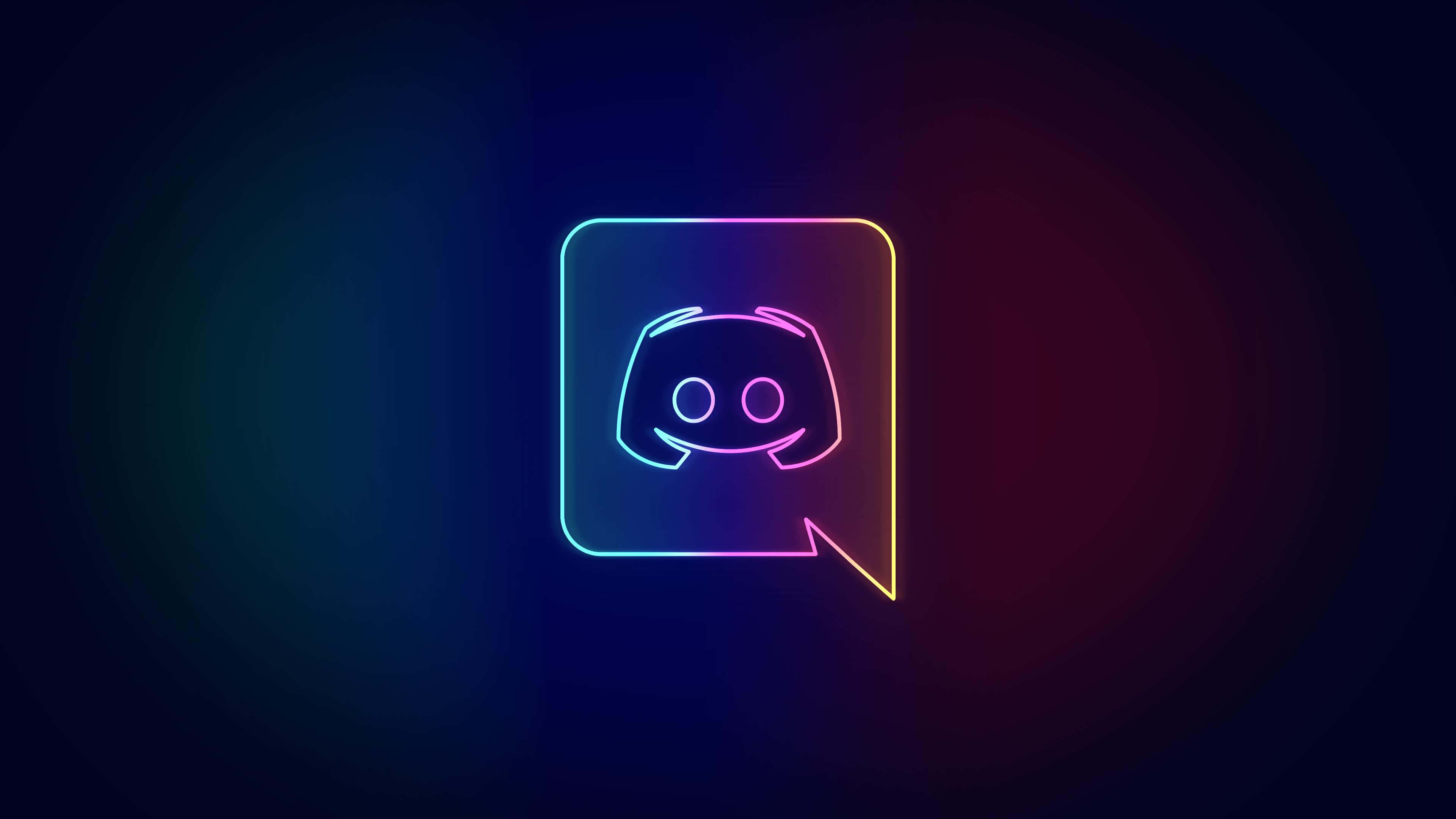 用 Discord 讓朋友更近，社群更緊密 壁紙 — 一個發光的霓虹燈Discord標誌在對話氣泡中，在深色漸變背景上散發出鮮豔的彩虹色調。