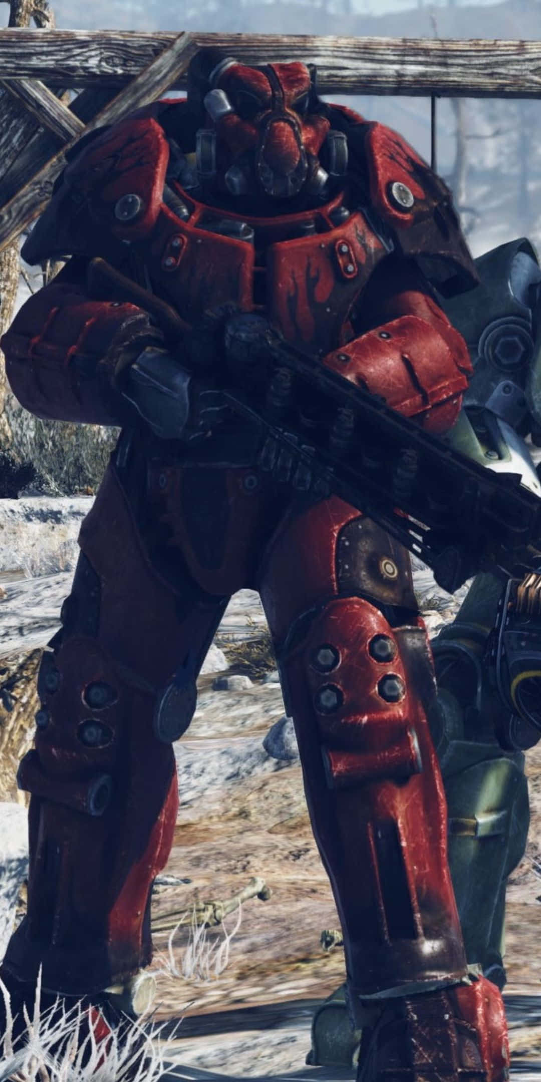 用 Pixel 3 沉浸於 Fallout 76 的後末日世界 壁紙 — 一個身穿重型紅色動力裝甲的士兵站在雪地荒野中，手持步槍。