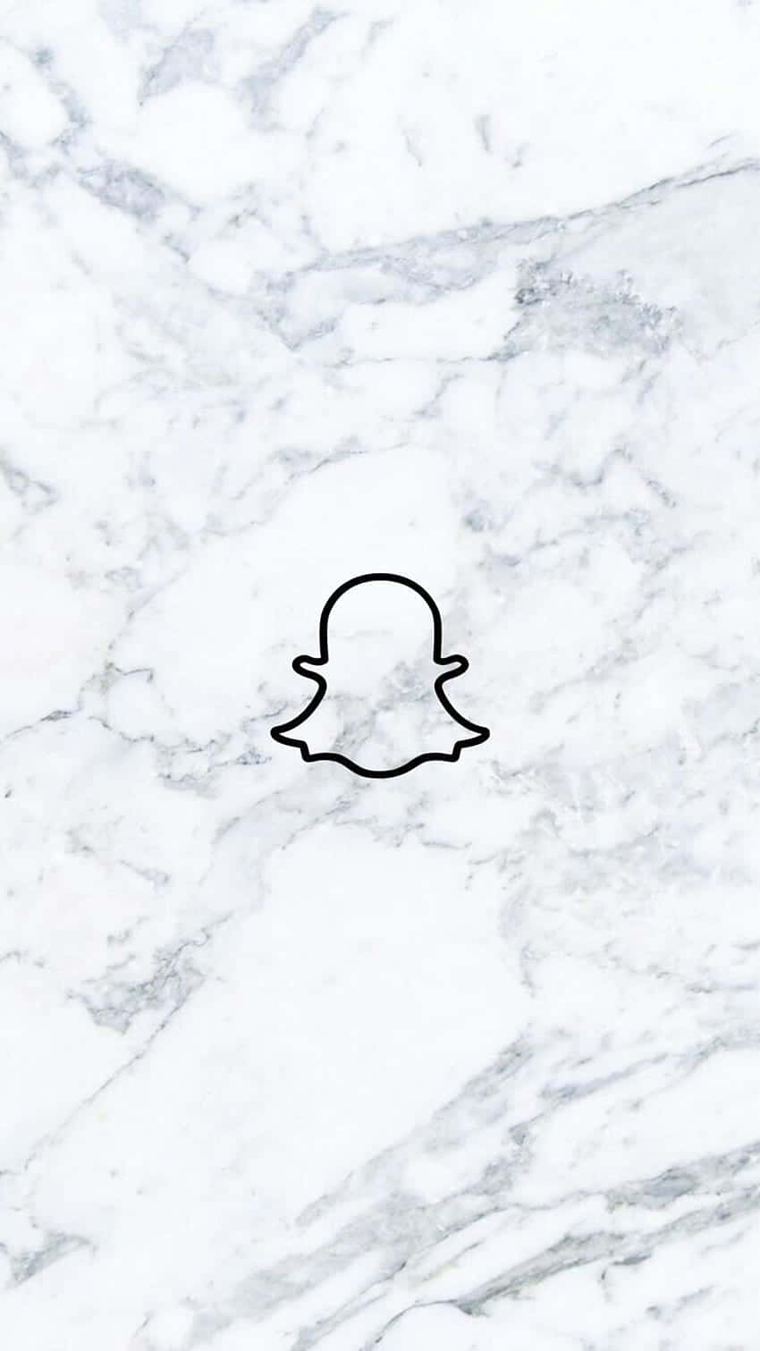 Snapchat鬼魂標誌在白色大理石背景上