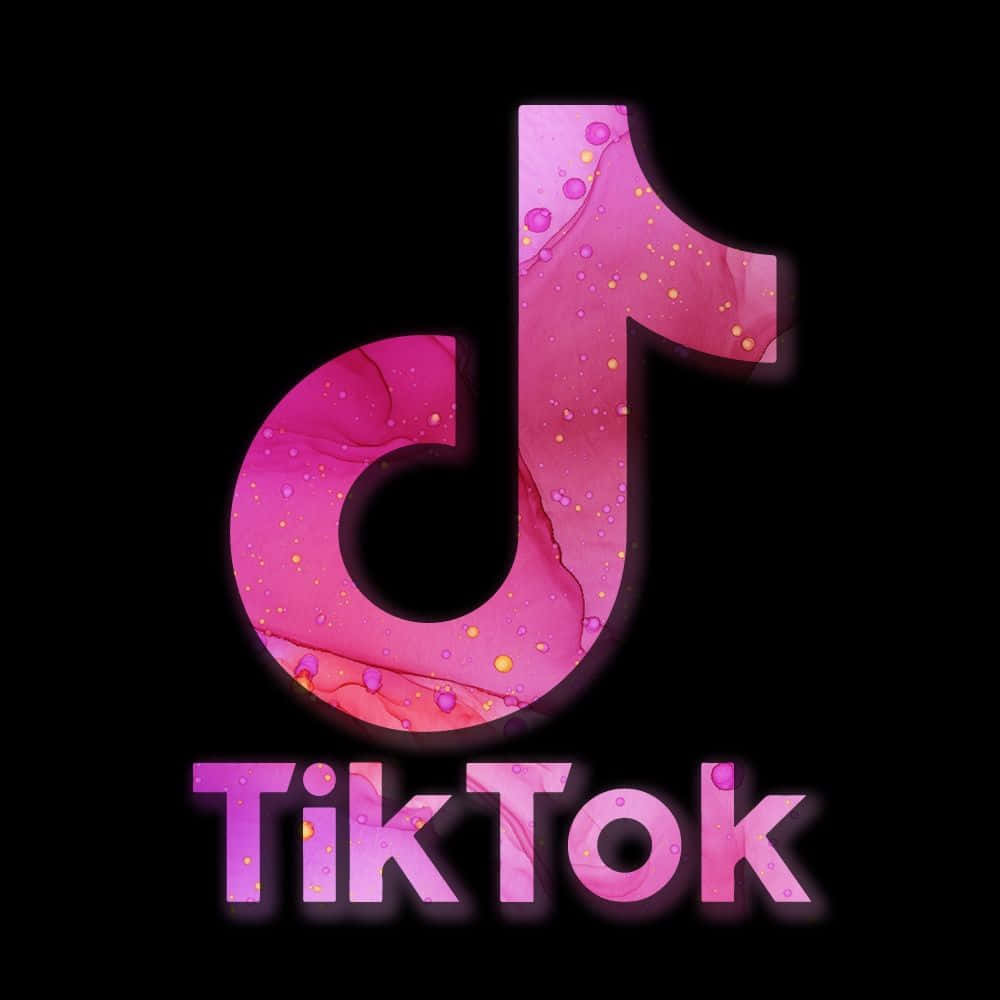 黑色背景上帶有粉紅色液體和氣泡的TikTok標誌