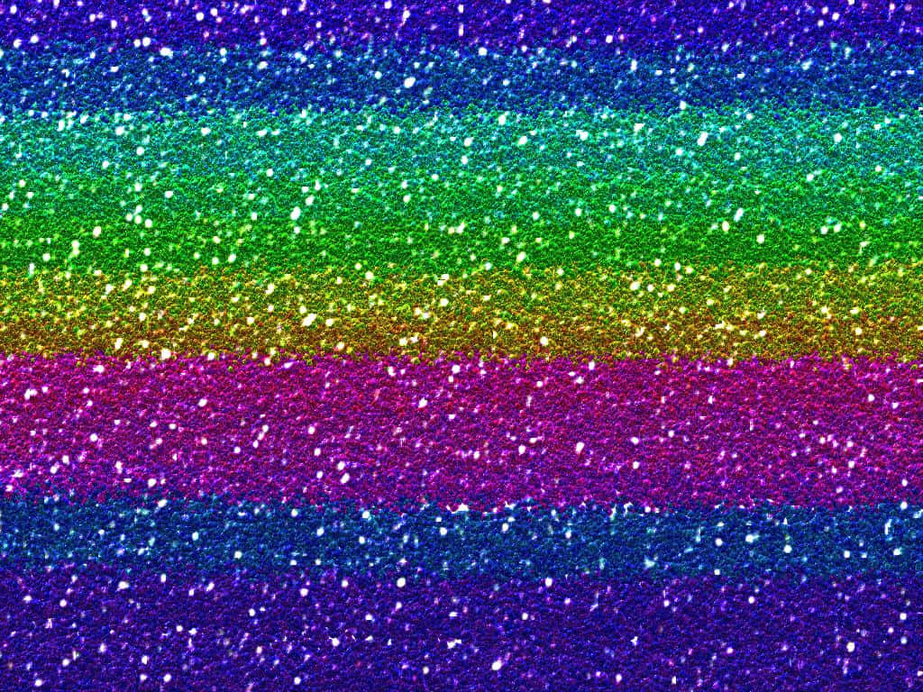 用Wallpapers.com的彩虹閃粉為生活增添光彩 壁紙 — 充滿活力的彩虹閃粉條紋在紋理表面上閃爍著閃閃發光的顆粒。