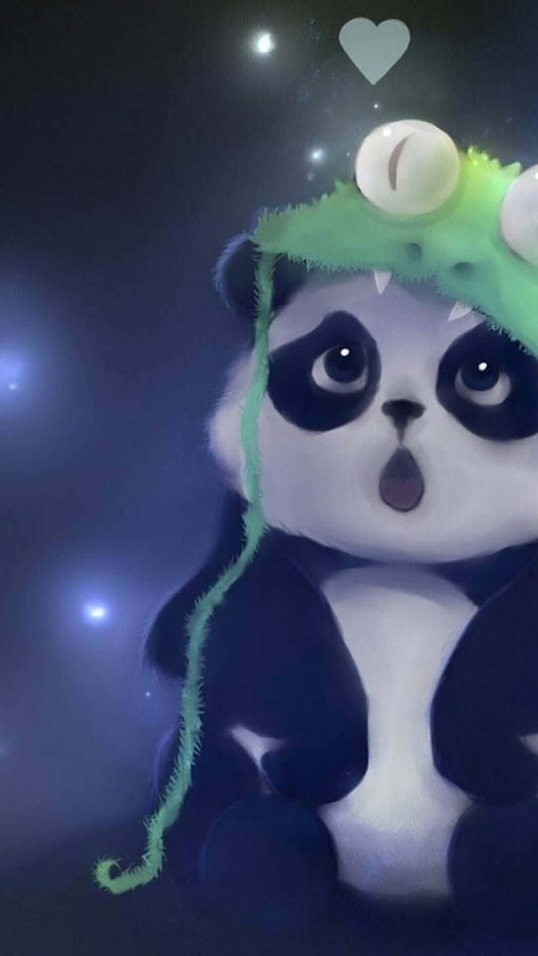 用可愛動物 iPhone 傳遞快樂 壁紙 — 一隻可愛的熊貓戴著綠色怪物帽，帽上有眼睛和尖牙，在星空下顯得驚訝，上方漂浮著一顆心。
