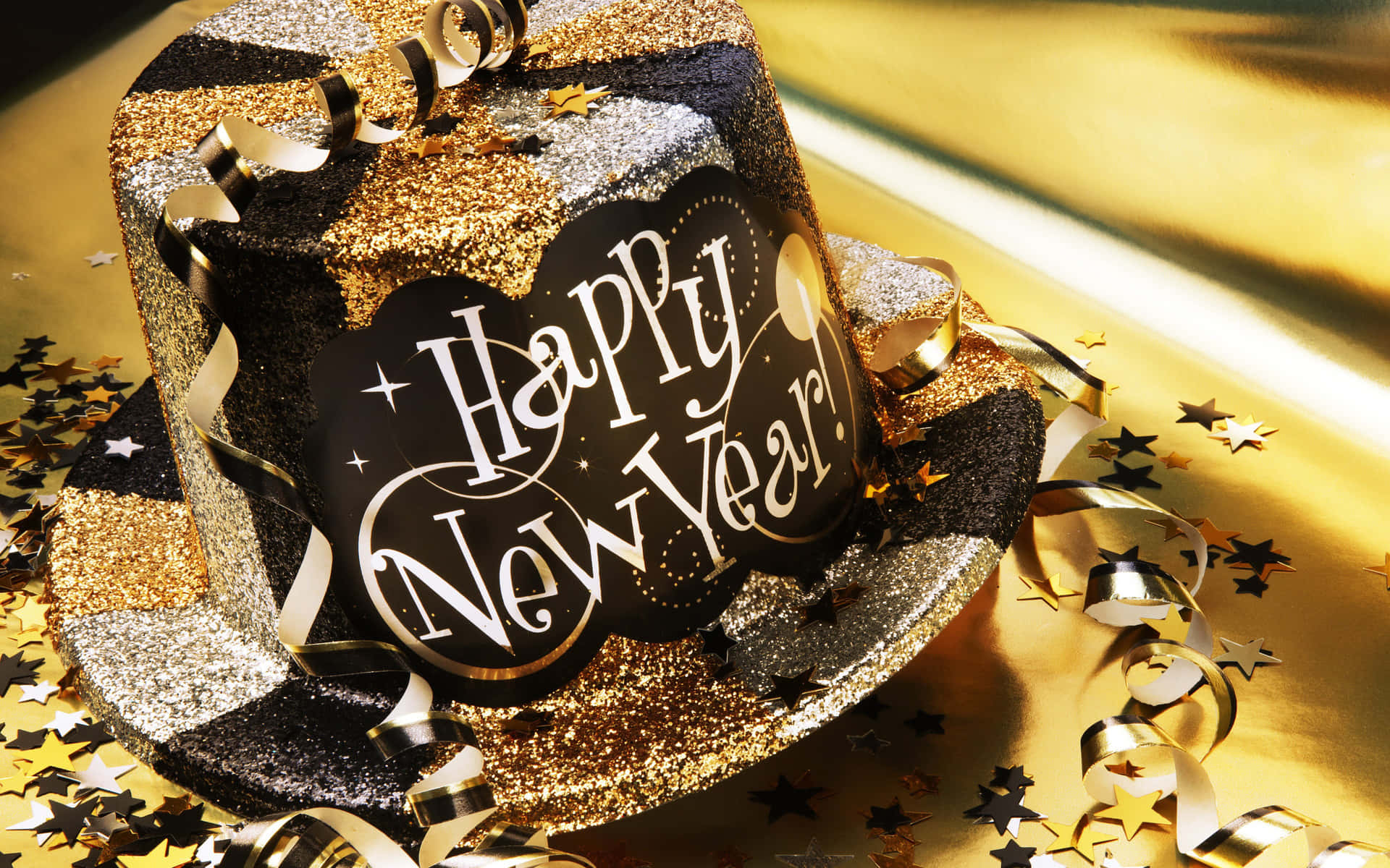 節日黑色和金色閃亮高頂禮帽，帶有Happy New Year文字，周圍環繞五彩紙屑。