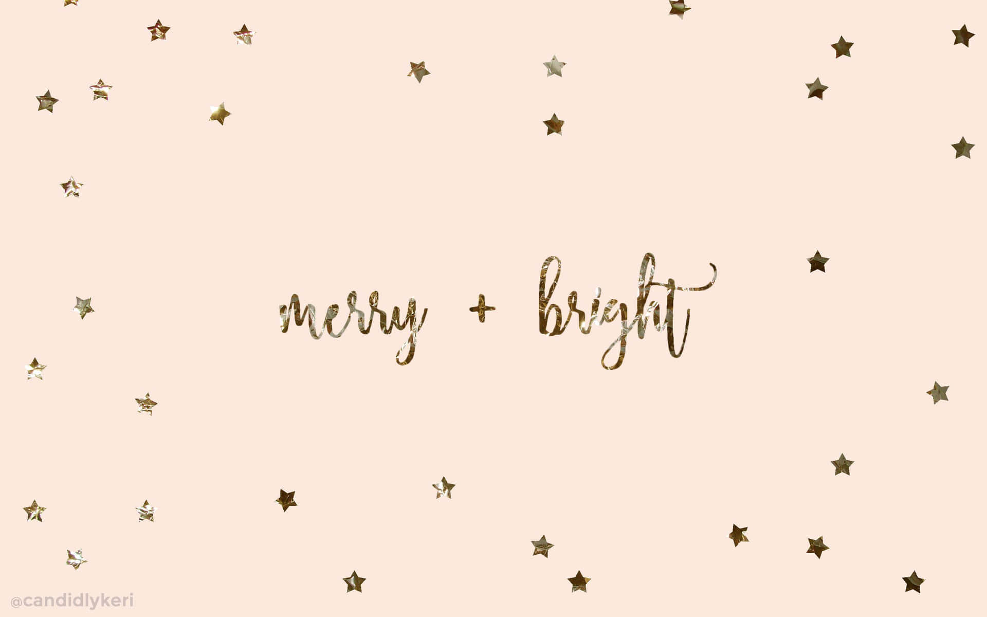 桃色背景上的金色星星和merry bright文字