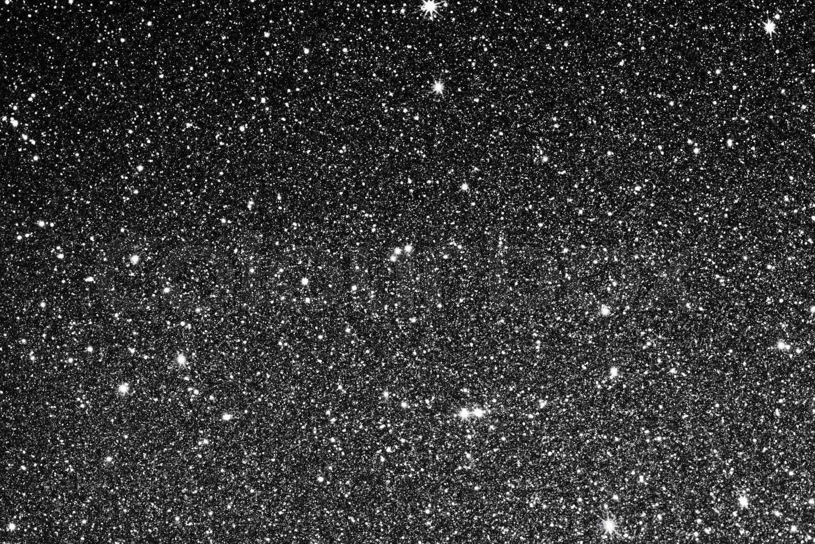 一個充滿無數閃爍星星的星空夜空，背景為黑色。