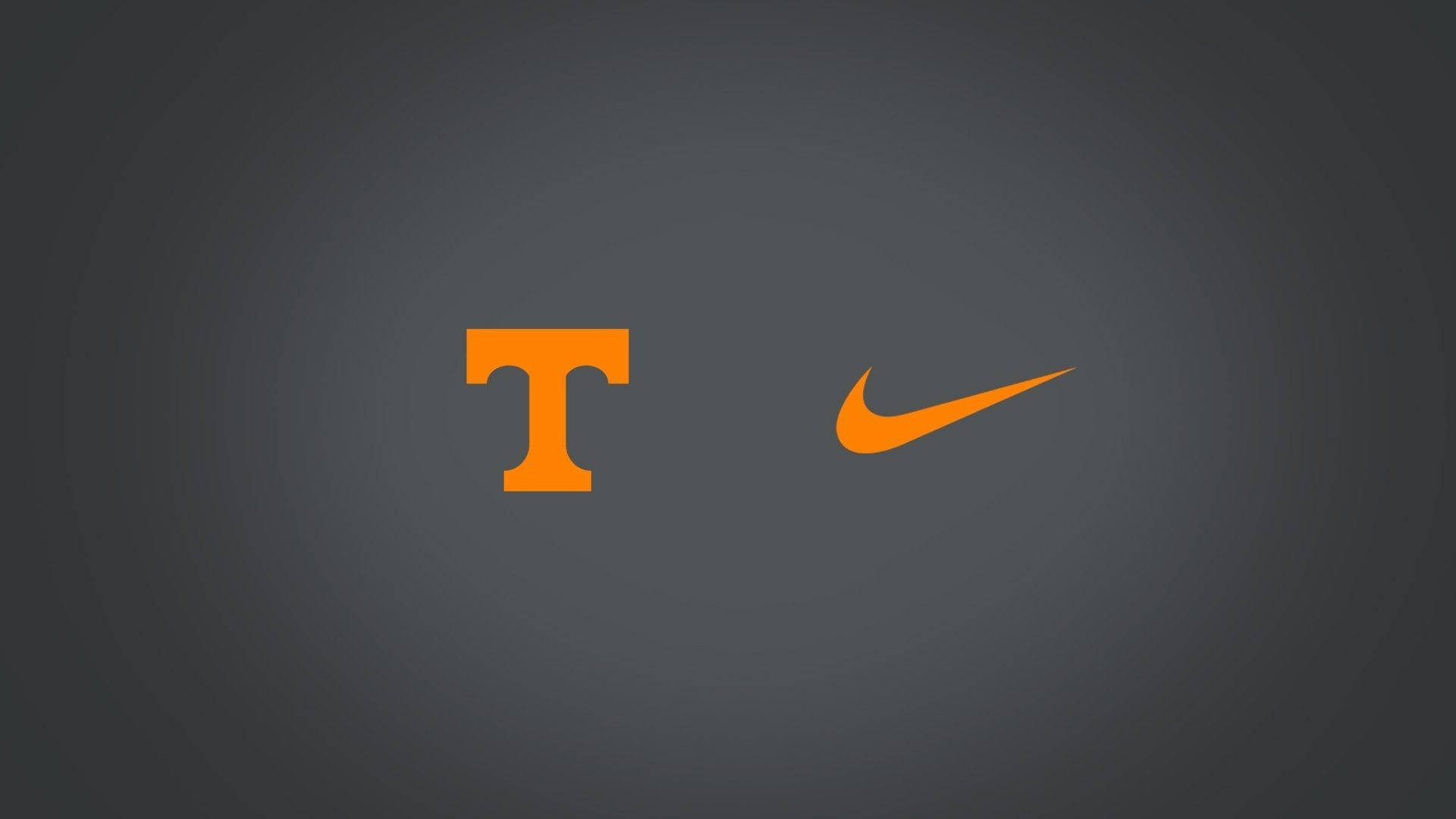 橙色田納西州 T 標誌和 Nike 勾勾在灰色背景上