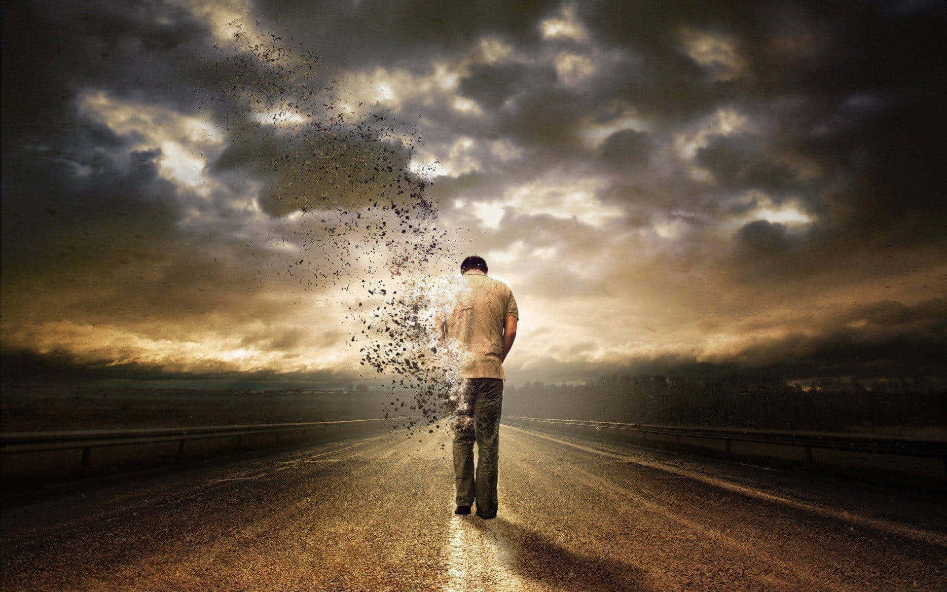 一個男人在路上行走，在暴風雨的天空下分解成粒子。