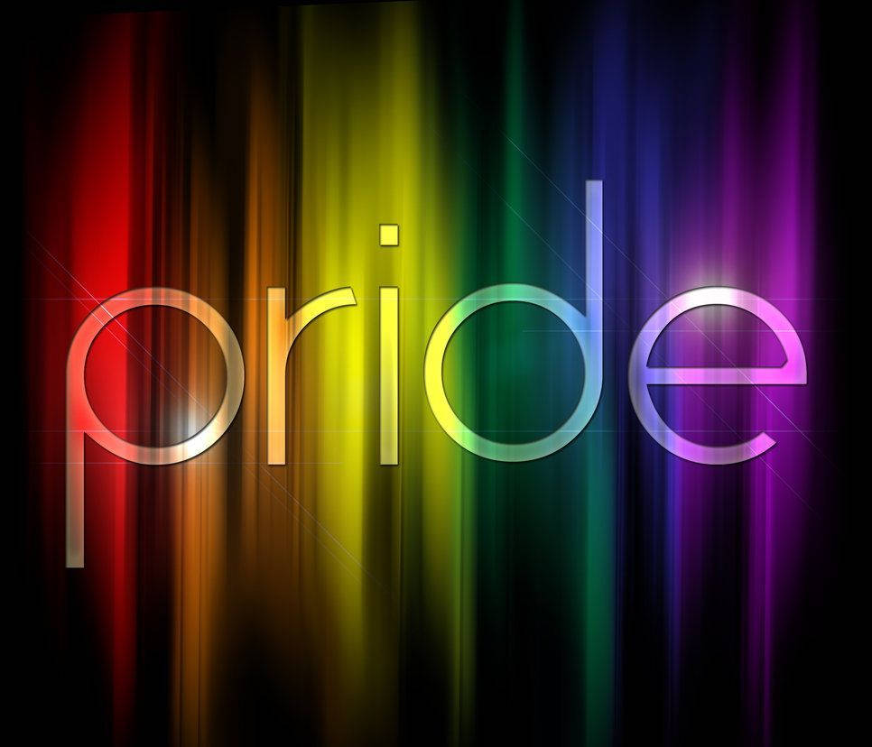 在黑暗背景上以發光彩虹色顯示的「pride」一詞。