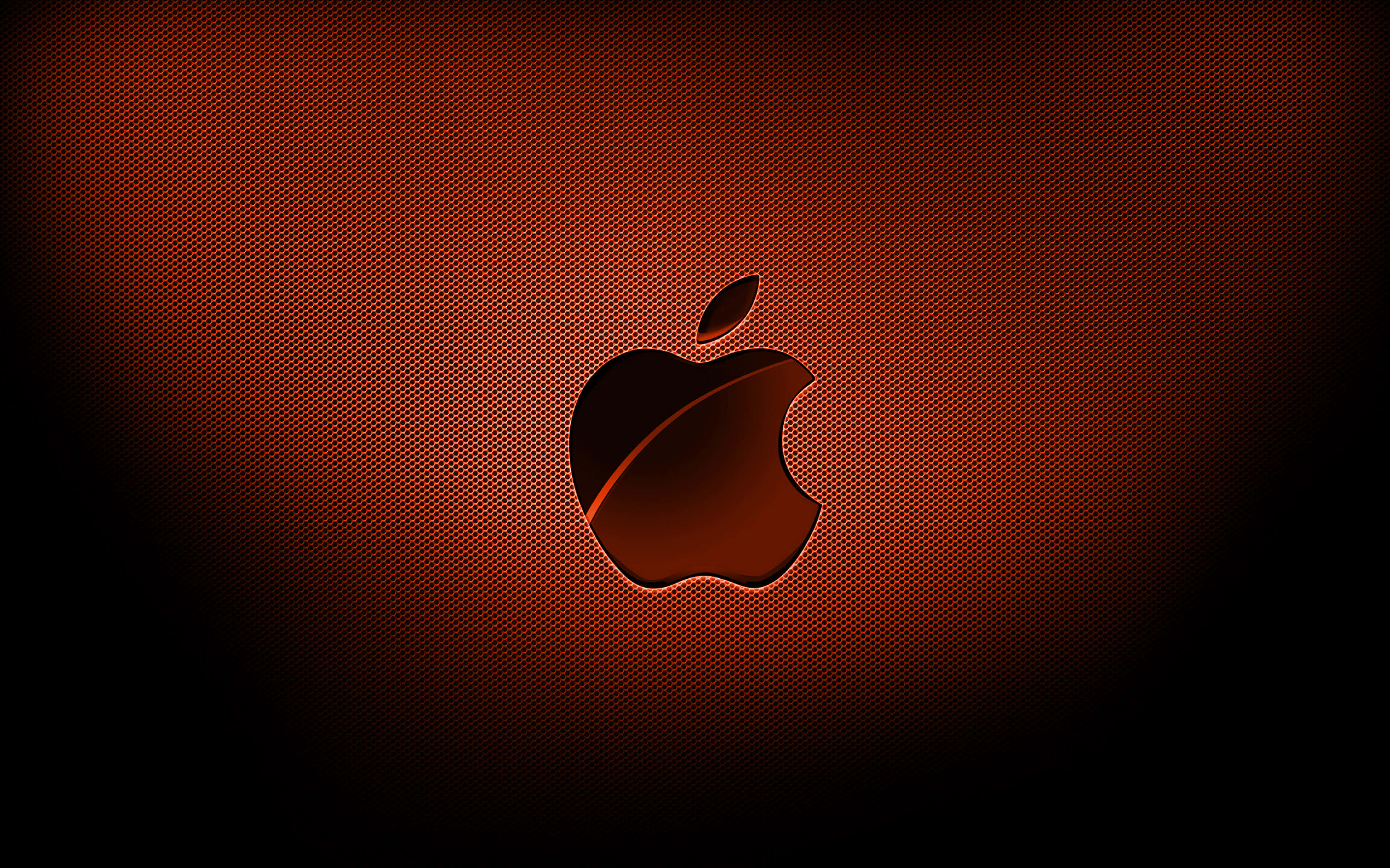 4K Apple 桌布 壁紙 — 發光的Apple標誌居中於帶有紋理的深紅色漸變背景上，並帶有黑色暈影。