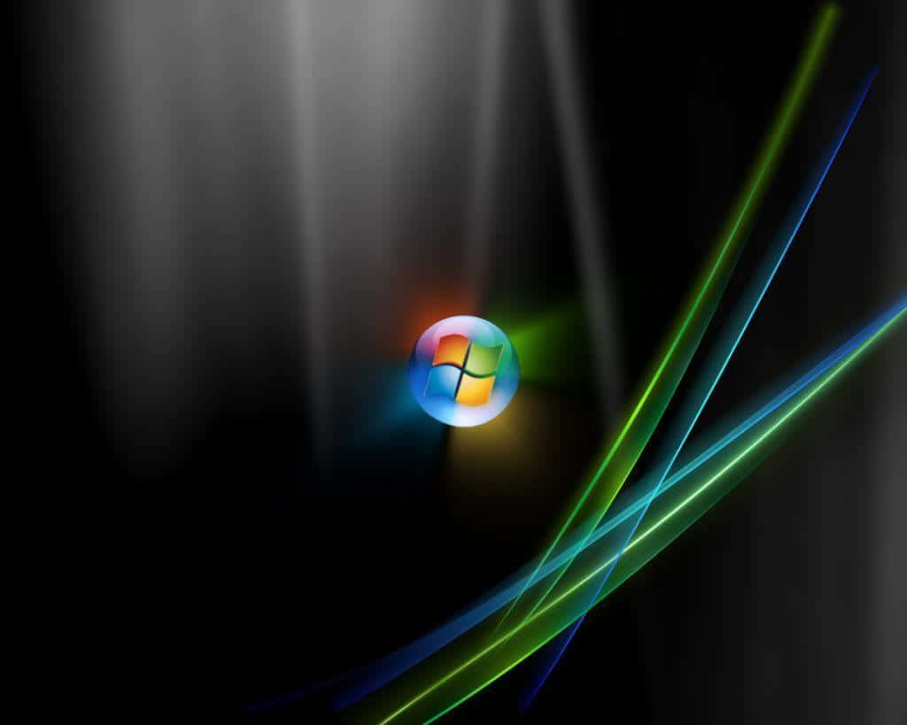 Windows Vista 桌布 壁紙 — 發光的Windows標誌在深色漸變背景上散發出色彩繽紛的光束。