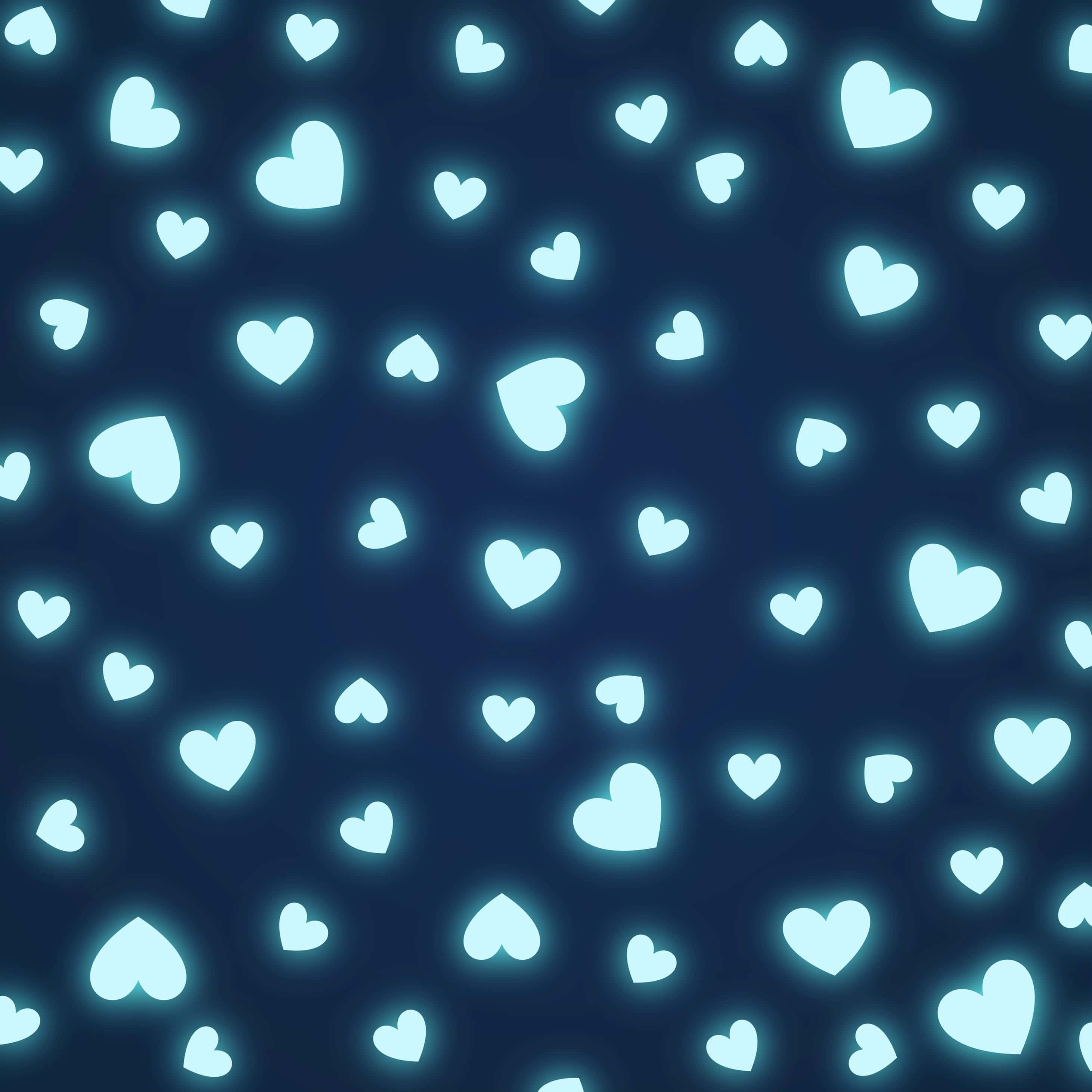 Heart Pattern 桌布 壁紙 — 發光的淺藍色心形在深海軍藍背景上以分散的圖案漂浮。