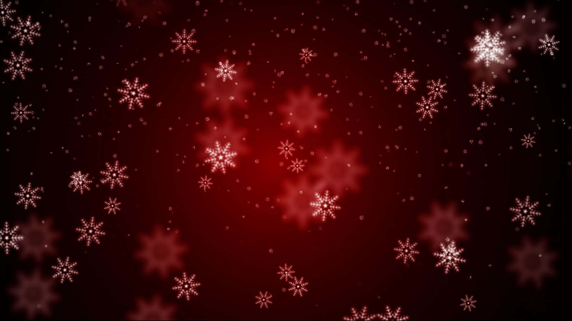 Dark Christmas 桌布 壁紙 — 發光的白色雪花在深紅色漸變背景上飄動，帶有柔和散景效果。